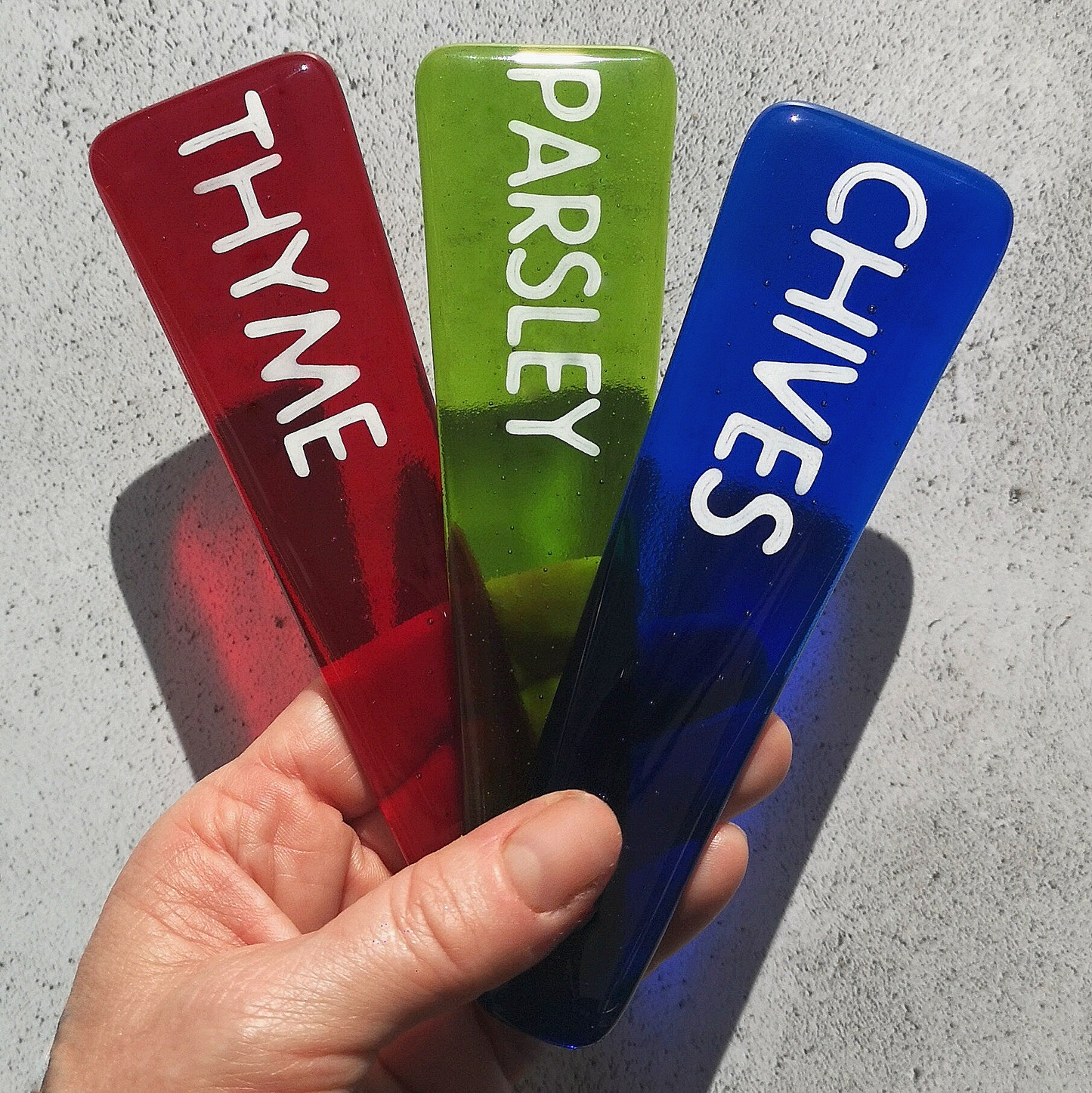 Handmade colourful fused glass plant labels that won't fade or rot with sunlight or moisture. Personalised plant markers for pot plants. Garden lover gift.