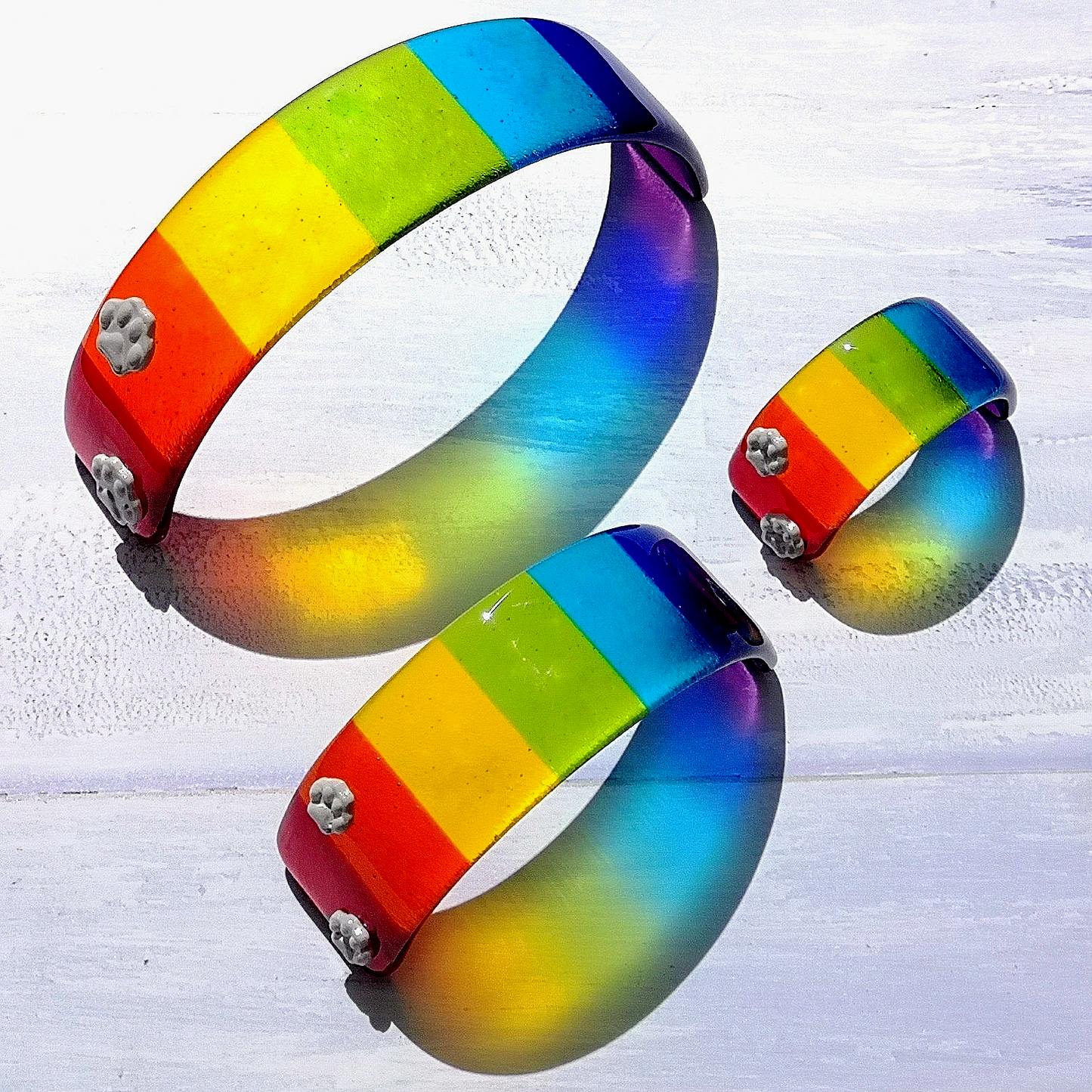 Handmade fused glass curved rainbow bridge. 3D pet paw prints. Free standing rainbow arch. Brightly coloured glass gift. Suncatcher, light catcher. Gift for pet loss, remembrance.