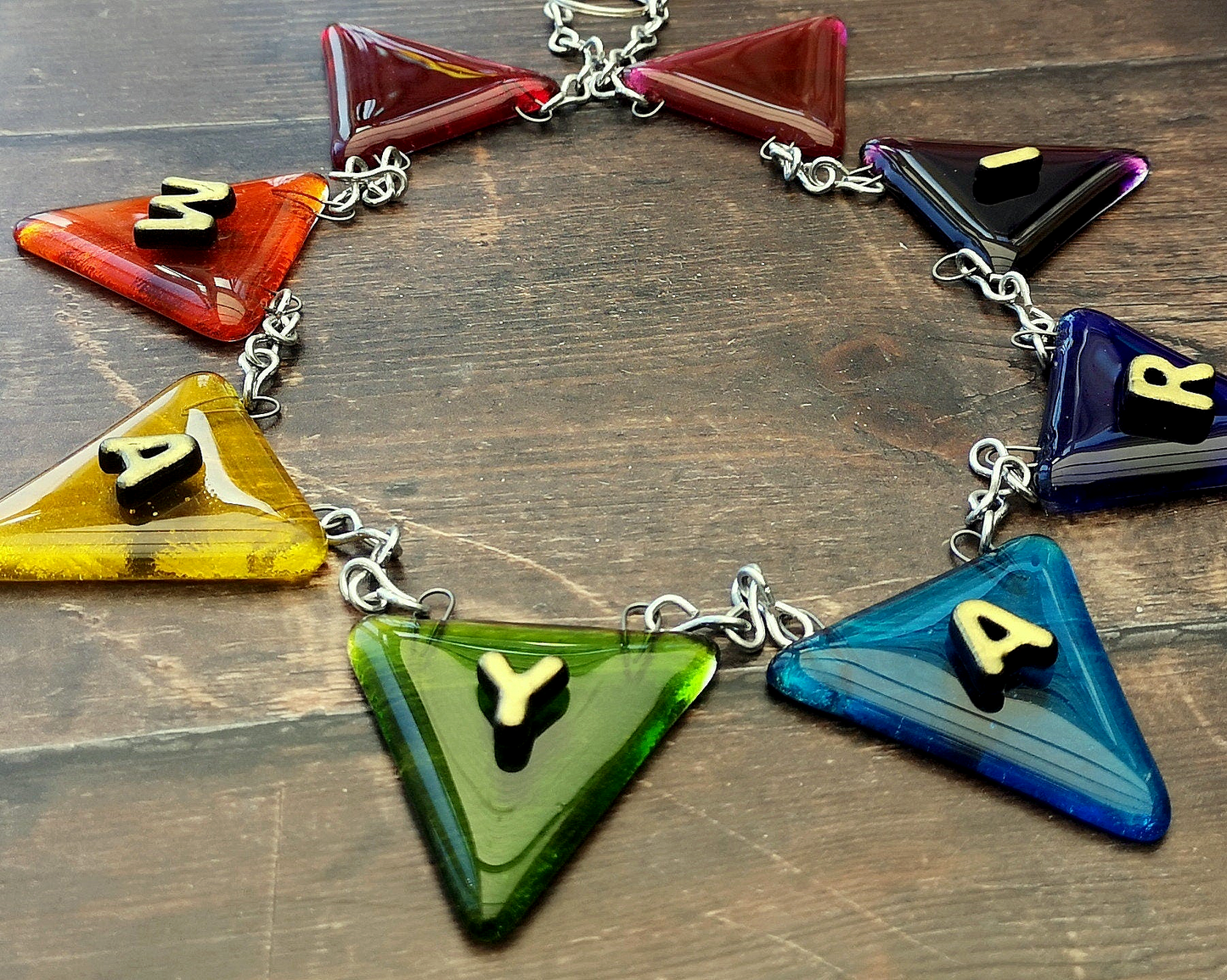 Handmade fused glass personalised name bunting. Customised 3D name plaque. Child's name door sign. Colourful glass bunting, name plate, new baby gift. Expecting Mum present.