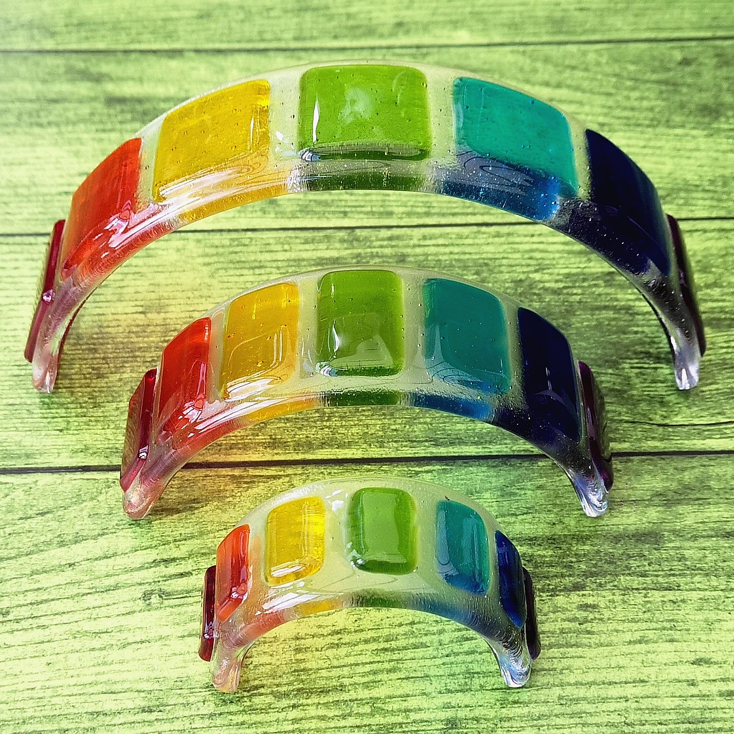 Handmade fused glass curved rainbow bridge. 3D pet paw prints. Free standing rainbow arch, rainbow steps. Brightly coloured glass gift. Suncatcher, light catcher. Gift for pet loss, remembrance.