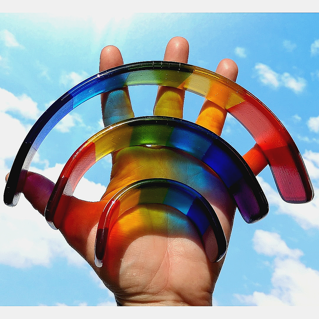 Handmade fused glass curved rainbow bridge. 3D pet paw prints. Free standing rainbow arch. Brightly coloured glass gift. Suncatcher, light catcher. Gift for pet loss, remembrance.