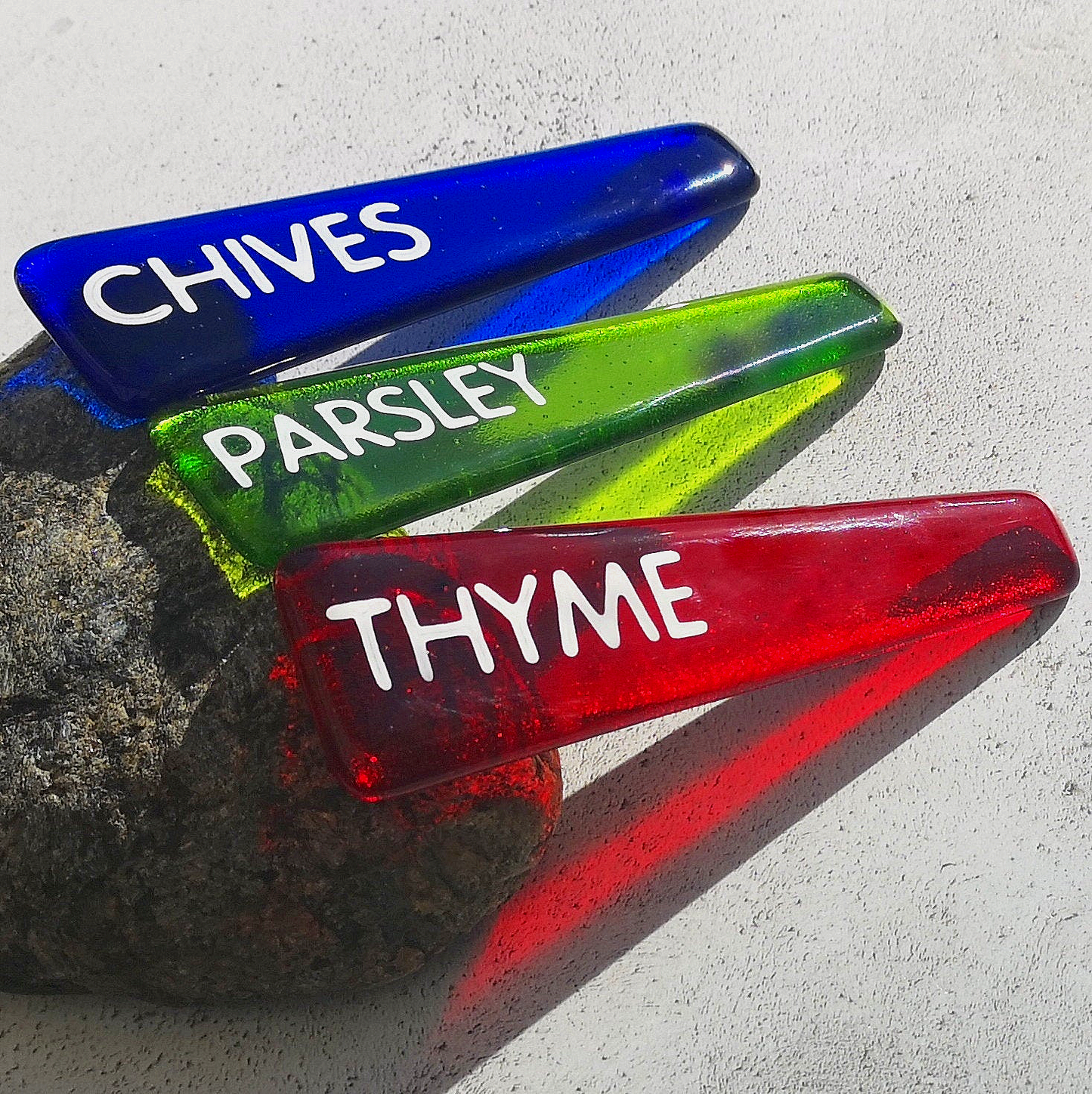Handmade colourful fused glass plant labels that won't fade or rot with sunlight or moisture. Personalised plant markers for pot plants. Garden lover gift.