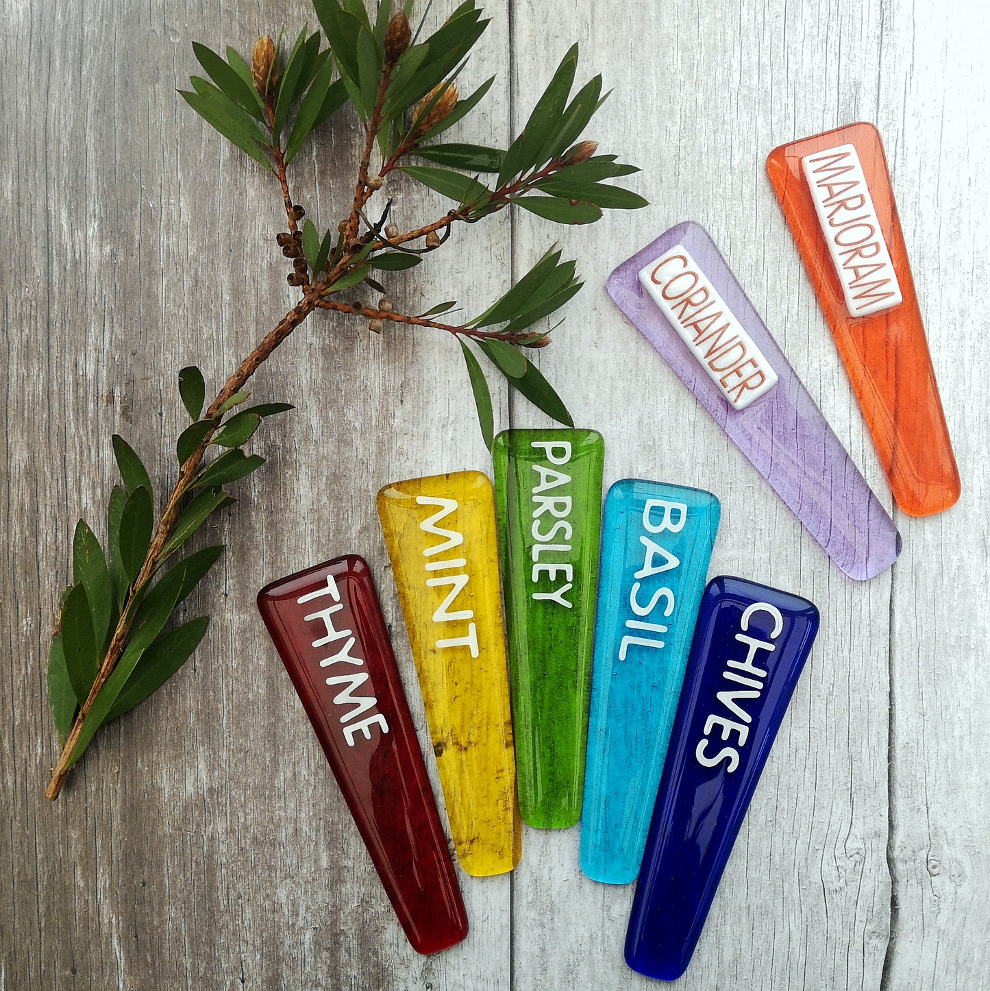 Handmade colourful fused glass plant labels that won't fade or rot with sunlight or moisture. Personalised plant markers for pot plants. Garden lover gift.