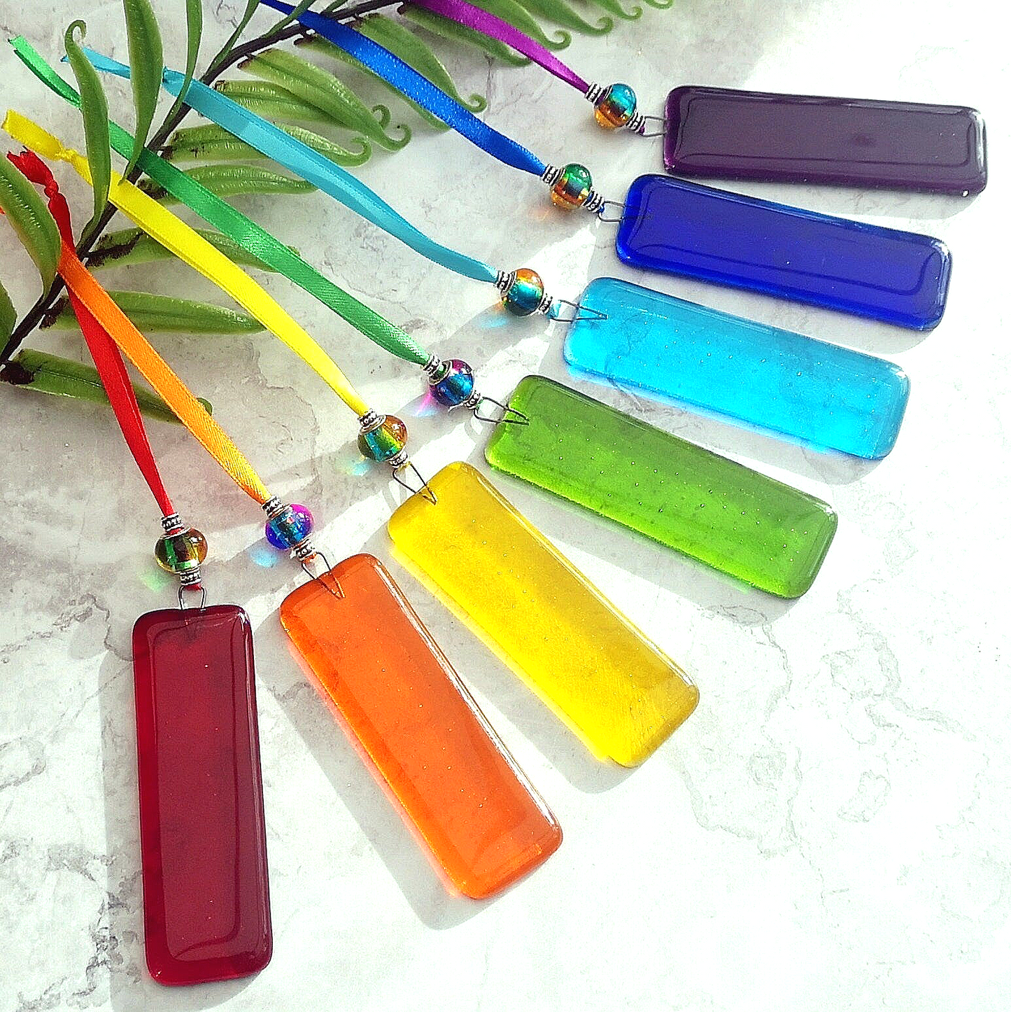 Handmade fused glass Rainbow Drops. Hanging Christmas tree decoration. Glass suncatcher bauble ornament, holiday decor gift, festive present.