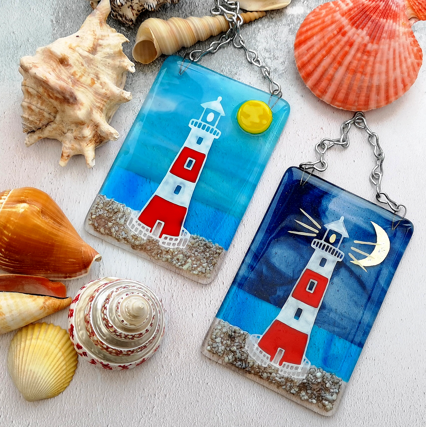 a couple of key chains sitting on top of a table