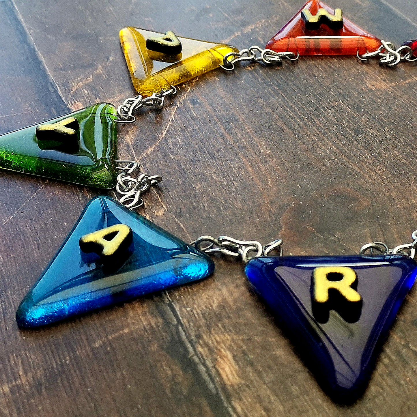Handmade fused glass personalised name bunting. Customised 3D name plaque. Child's name door sign. Colourful glass bunting, name plate, new baby gift. Expecting Mum present.