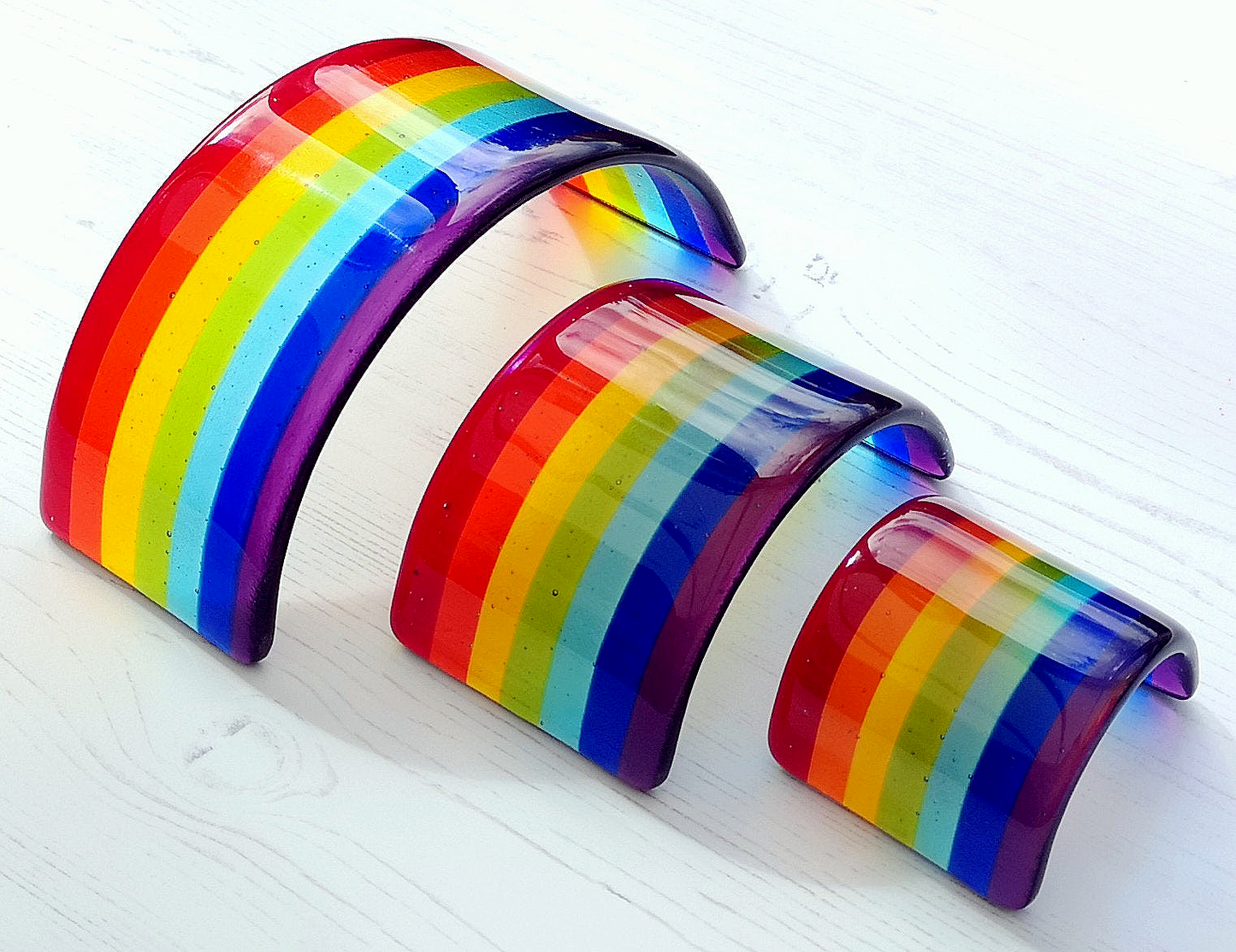 Handmade fused glass curved rainbow bridge. Free standing rainbow arch. Brightly coloured glass gift. Suncatcher, tealight candle surround. Gift for pet loss, remembrance.