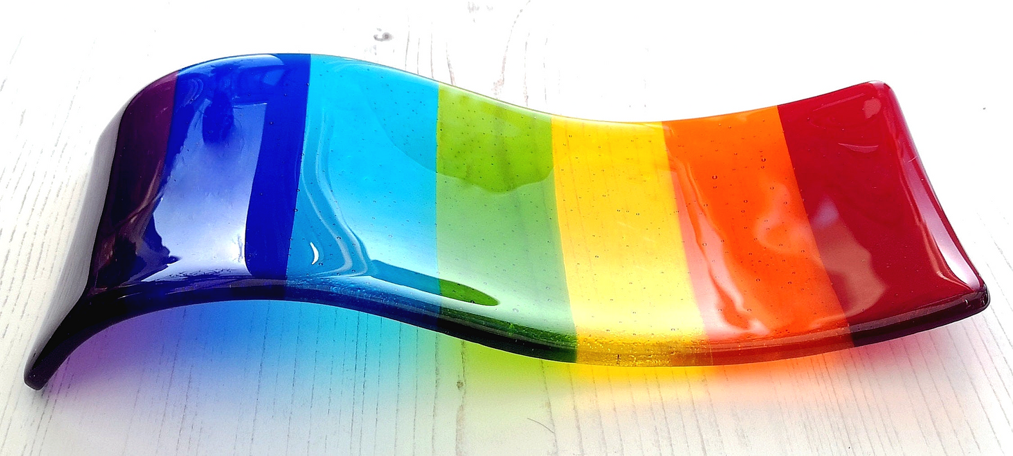 Handmade fused glass free standing Rainbow Curved Picture Suncatcher or Spoon Rest. Brightly coloured wavy light catcher, rainbow decor.