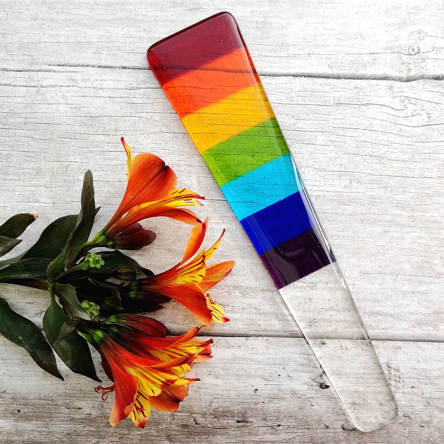 Handmade fused glass rainbow plant pot suncatcher. Colourful plant marker ornament. Rainbow striped plant stake. Herb, vegetable, flower, fruit garden.