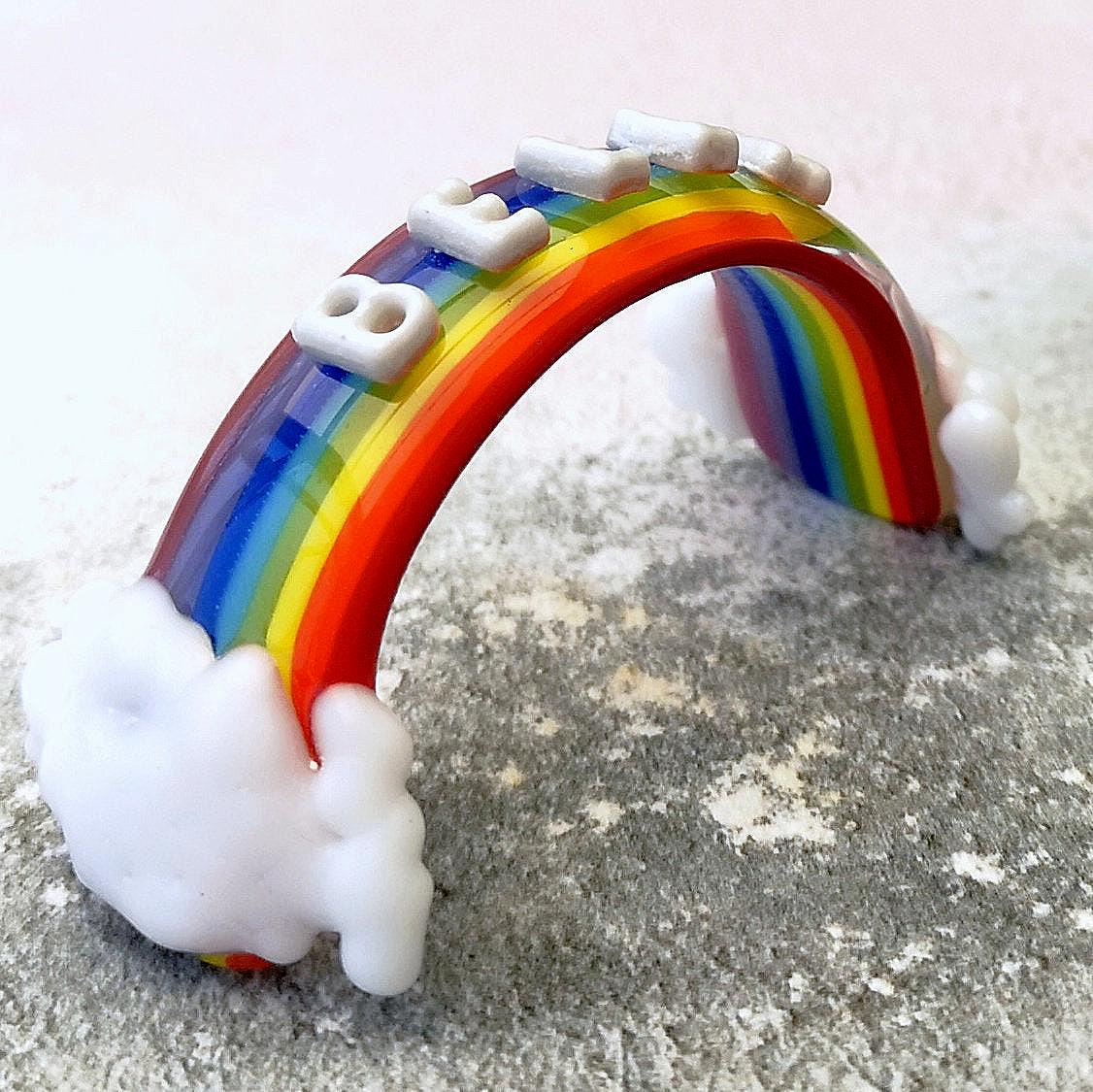 Handmade fused glass curved rainbow bridge with clouds. Free standing personalised 3D name rainbow arch. Brightly coloured glass gift. Suncatcher, light catcher. Gift for pet loss, remembrance.
