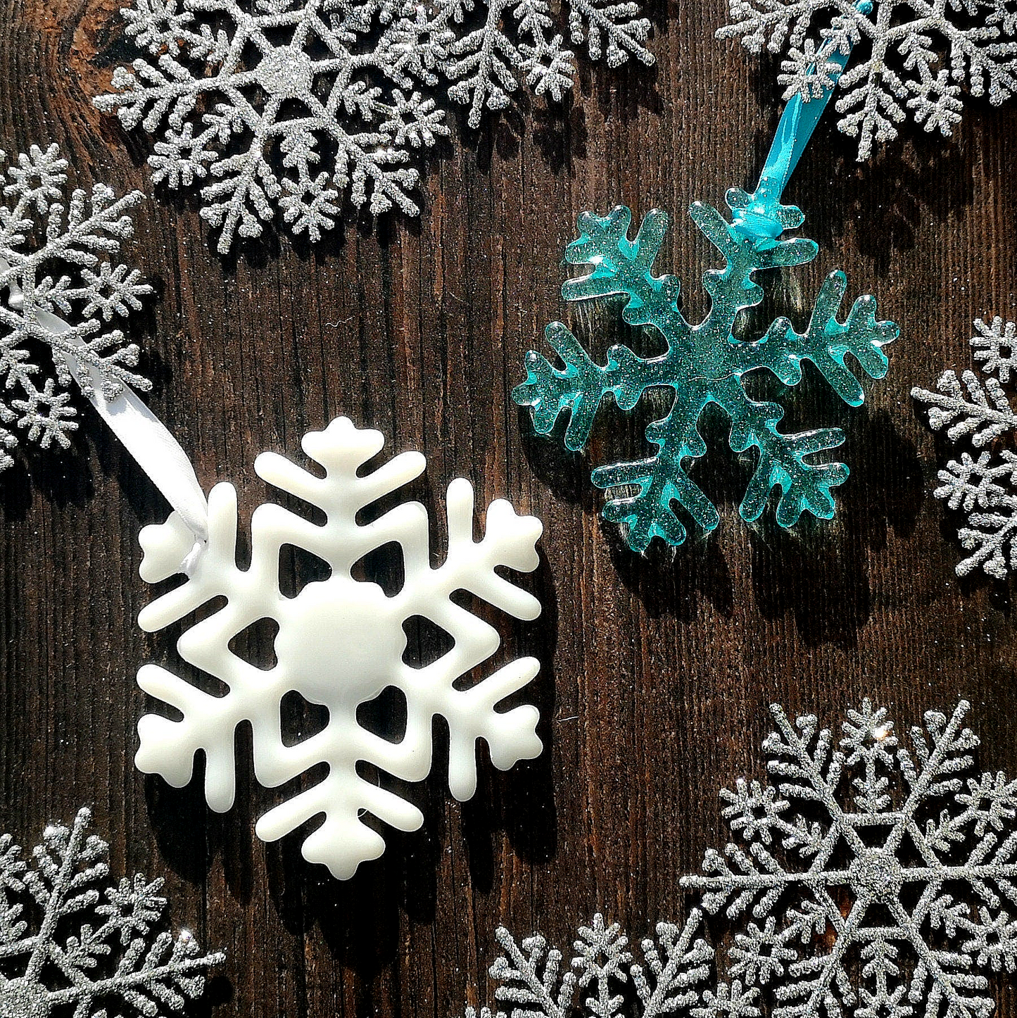 Snowflakes in Aqua Blue and White - A display of wintry Christmas tree decorations for a festive touch