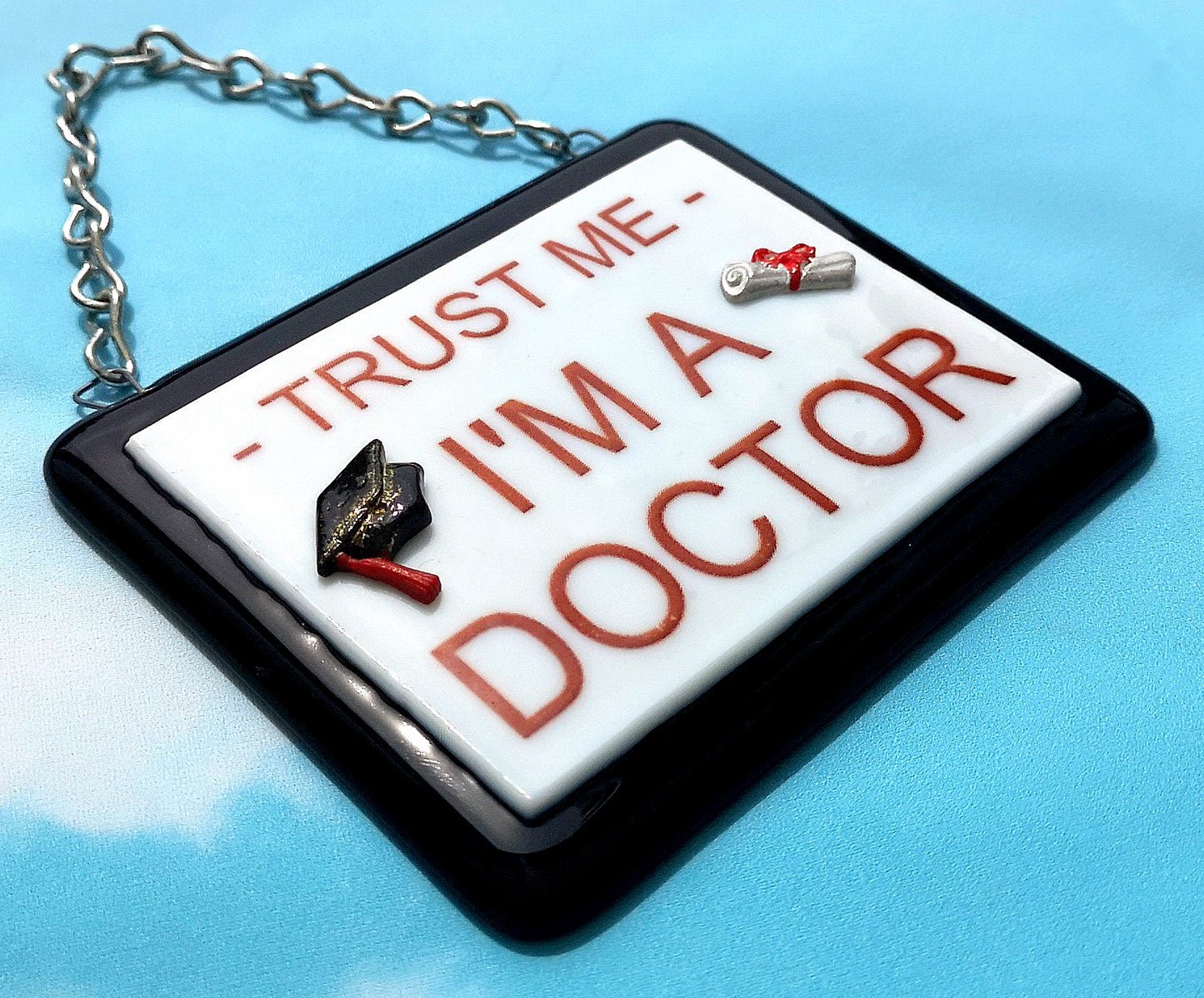 Handmade fused glass 'Trust Me I'm a Doctor' hanging picture. Custom, customised decoration award present. Personalised name gift for graduate, masters, doctorate degree. Name plaque certificate. Congratulations graduation.