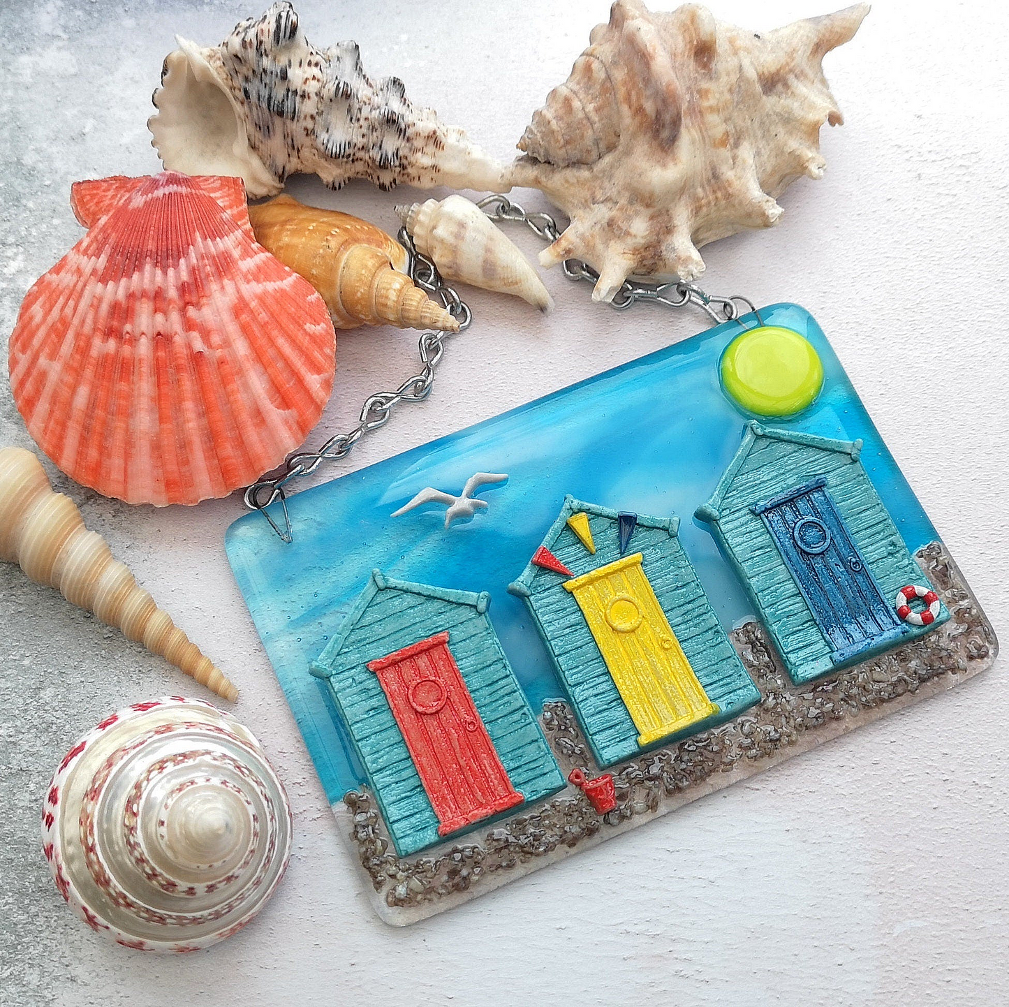 Handmade fused glass 3D Beach Huts Hanging Picture. Seaside wall art, beach gift decoration, sea ocean scene with glass pebbles, seagull, bucket and spade, bunting.