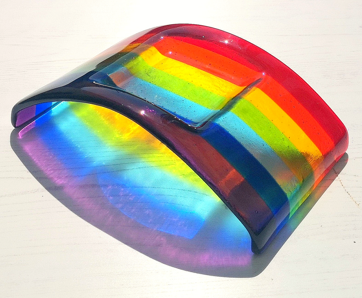 Handmade fused glass curved rainbow bridge candle holder. Free standing rainbow arch tealight candle holder. Brightly coloured glass gift. Suncatcher, light catcher. Gift for pet loss, remembrance.