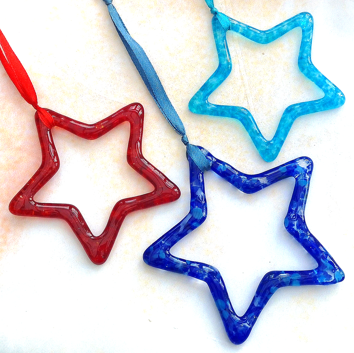 Handmade fused glass Hanging Star Outline Decoration, glass suncatcher, winter ornament, holiday decor, Christmas gift, festive present.