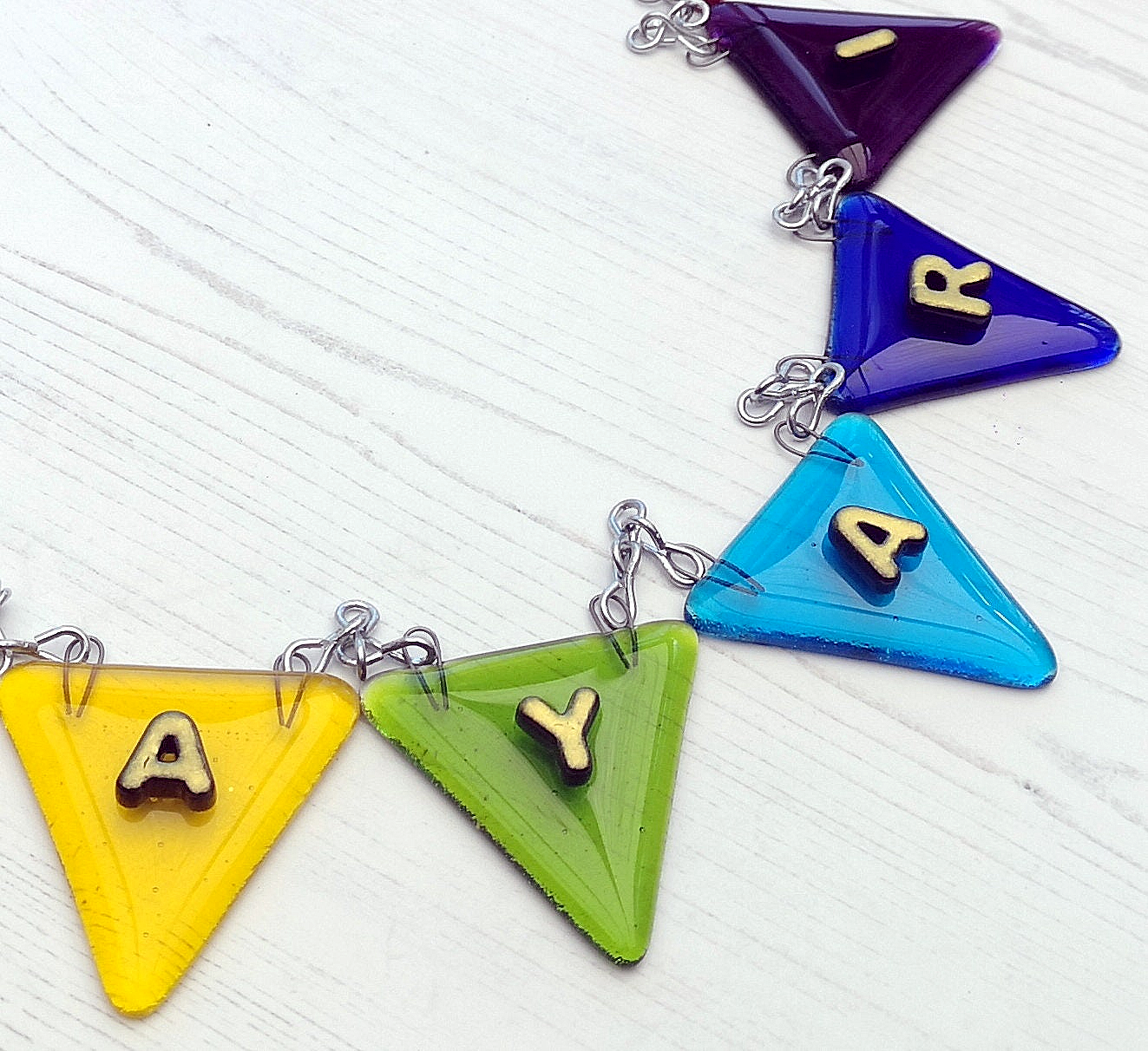 Handmade fused glass personalised name bunting. Customised 3D name plaque. Child's name door sign. Colourful glass bunting, name plate, new baby gift. Expecting Mum present.