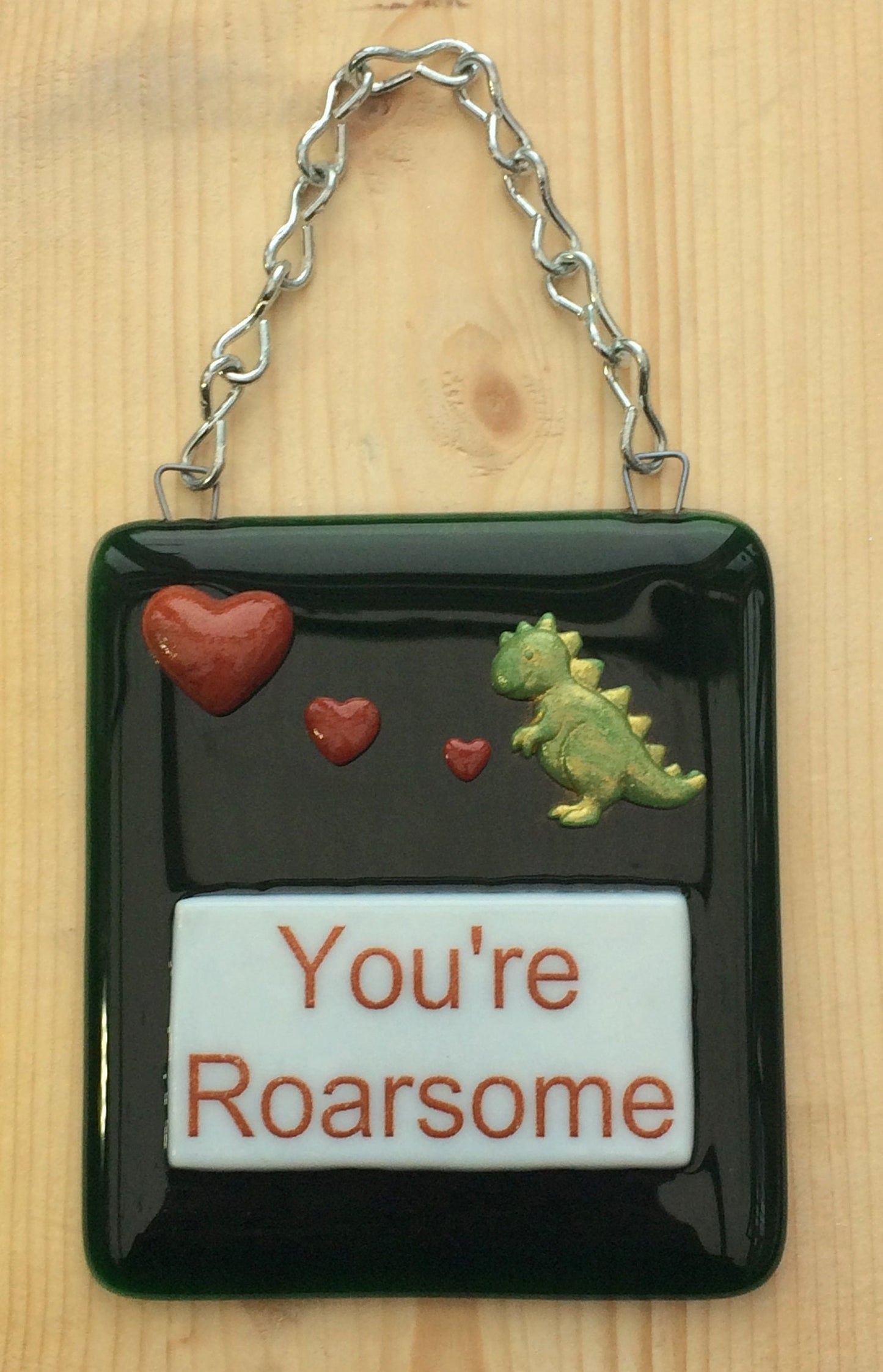 Handmade fused glass Awesome Roarsome Dinosaur Hanging Decoration. Valentine suncatcher gift. Romantic, love, message from the heart present. Girlfriend, boyfriend, partner, husband, wife.