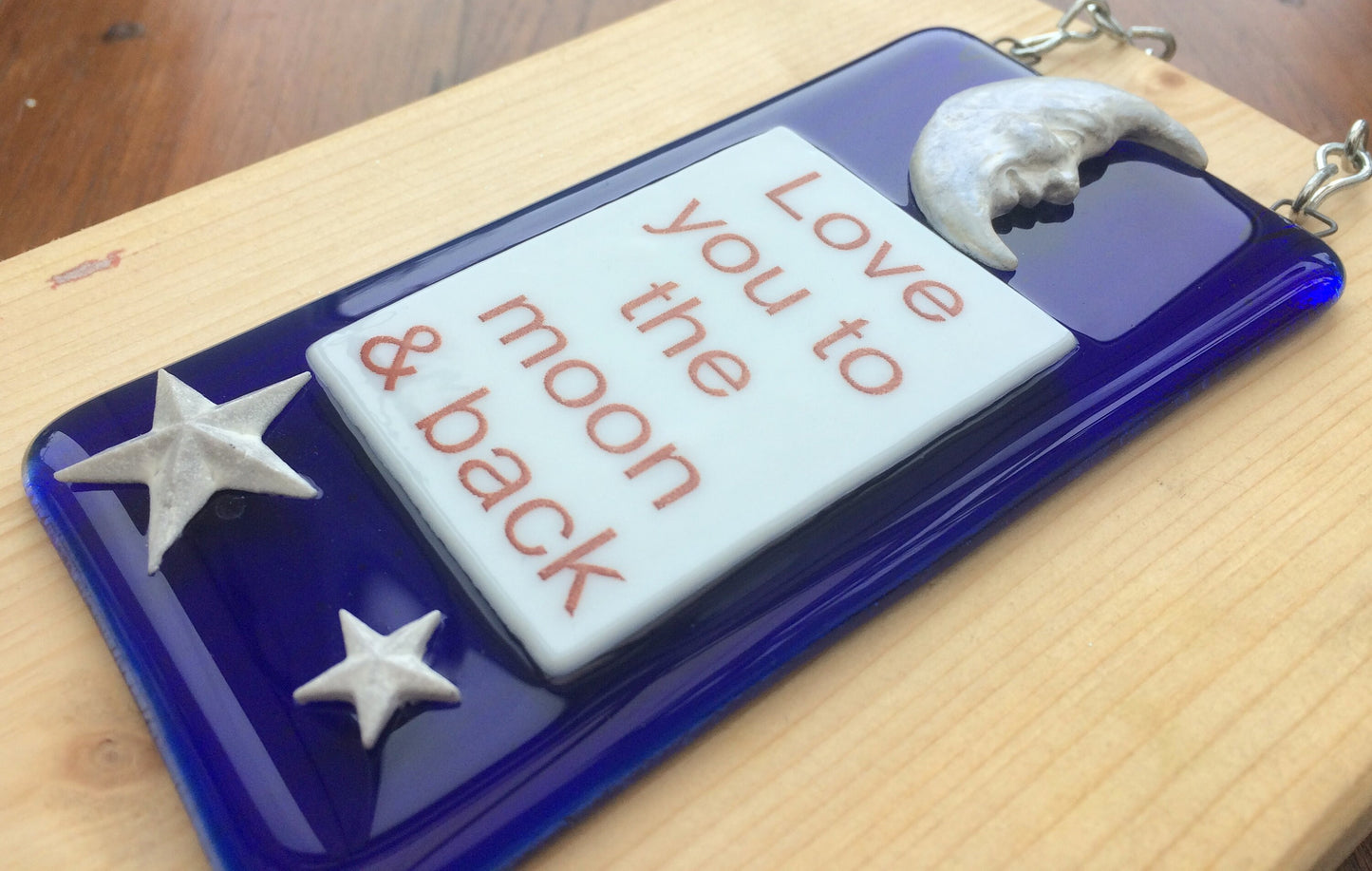 Handmade fused glass Love You To The Moon And Back Hanging Decoration. Valentine suncatcher gift. Moon and stars, romantic, love, message from the heart present. Girlfriend, boyfriend, partner, husband, wife.