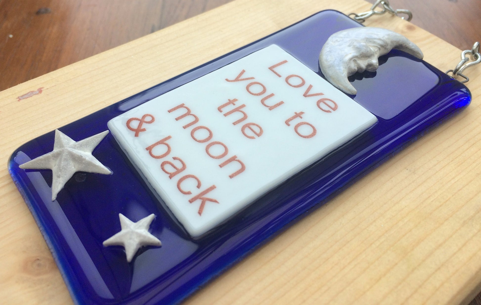 Handmade fused glass Love You To The Moon And Back Hanging Decoration. Valentine suncatcher gift. Moon and stars, romantic, love, message from the heart present. Girlfriend, boyfriend, partner, husband, wife.