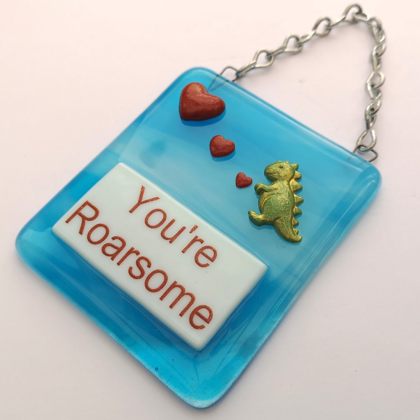 Handmade fused glass Awesome Roarsome Dinosaur Hanging Decoration. Valentine suncatcher gift. Romantic, love, message from the heart present. Girlfriend, boyfriend, partner, husband, wife.
