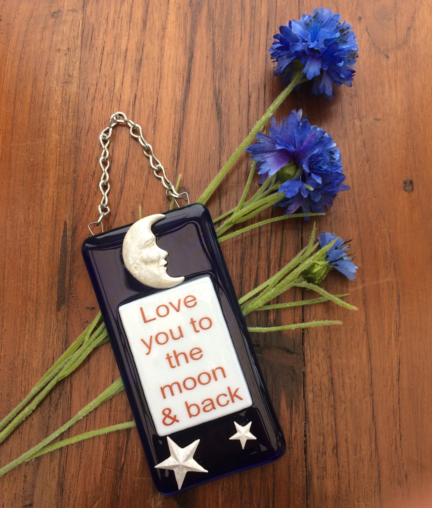 Handmade fused glass Love You To The Moon And Back Hanging Decoration. Valentine suncatcher gift. Moon and stars, romantic, love, message from the heart present. Girlfriend, boyfriend, partner, husband, wife.