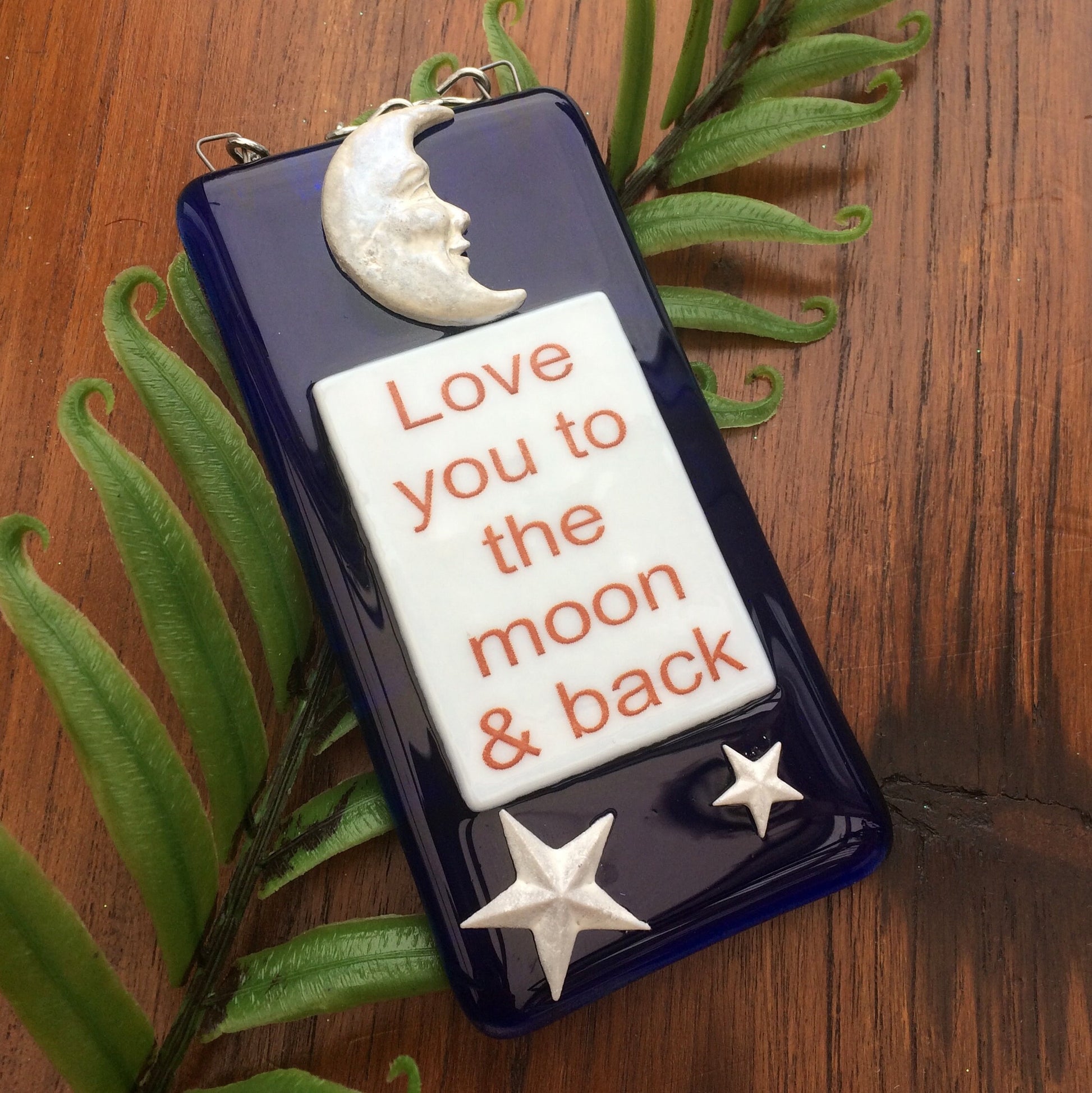Handmade fused glass Love You To The Moon And Back Hanging Decoration. Valentine suncatcher gift. Moon and stars, romantic, love, message from the heart present. Girlfriend, boyfriend, partner, husband, wife.
