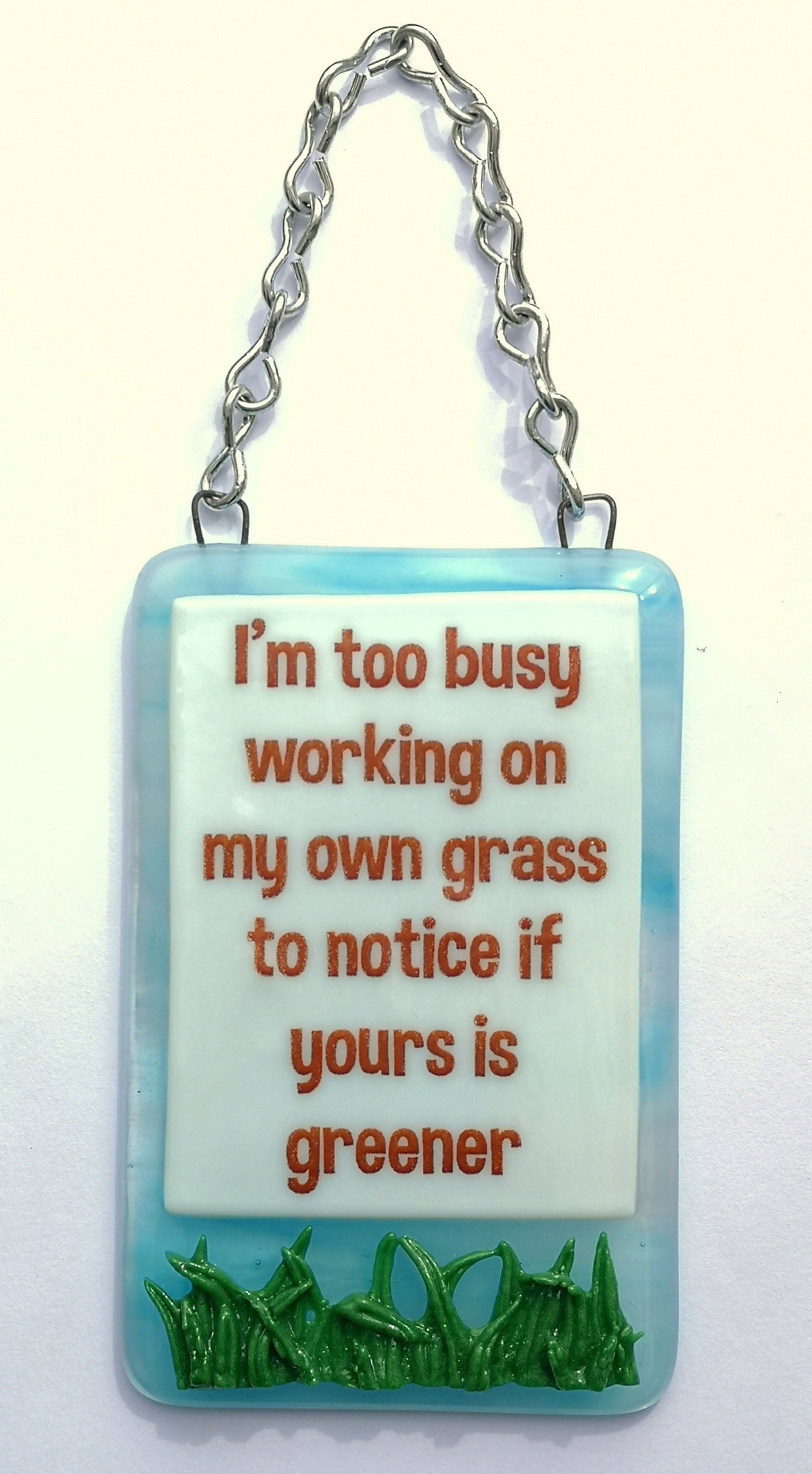 Handmade fused glass Busy Working On Own Grass To Notice If Yours Is Greener hanging picture suncatcher. Inspirational gift, funny card, humorous quote plaque, positive message sign.