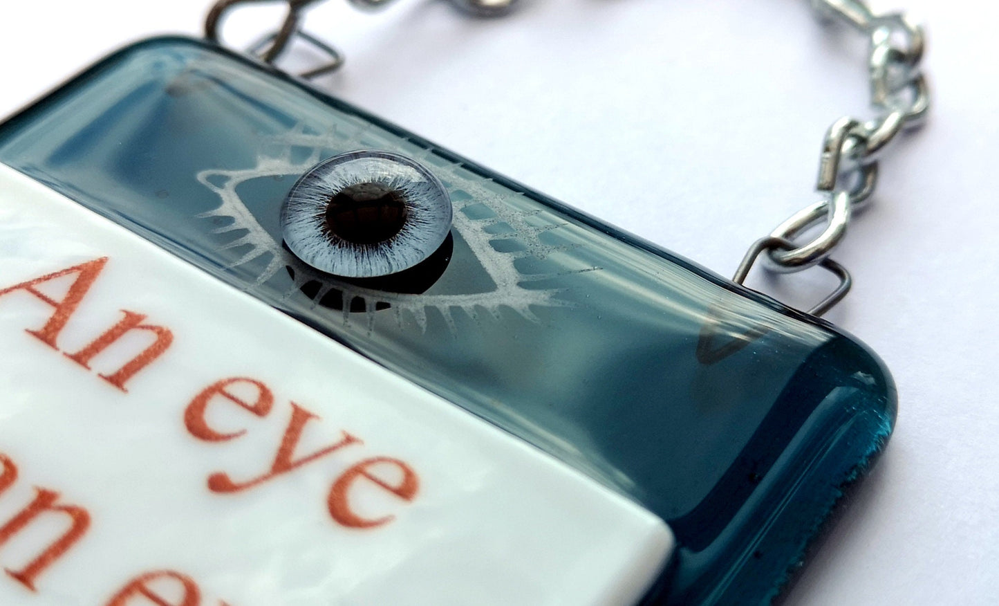Handmade fused glass An Eye For An Eye Leaves The Whole World Blind hanging picture suncatcher. Inspirational gift, funny card, humorous quote plaque, positive message sign.