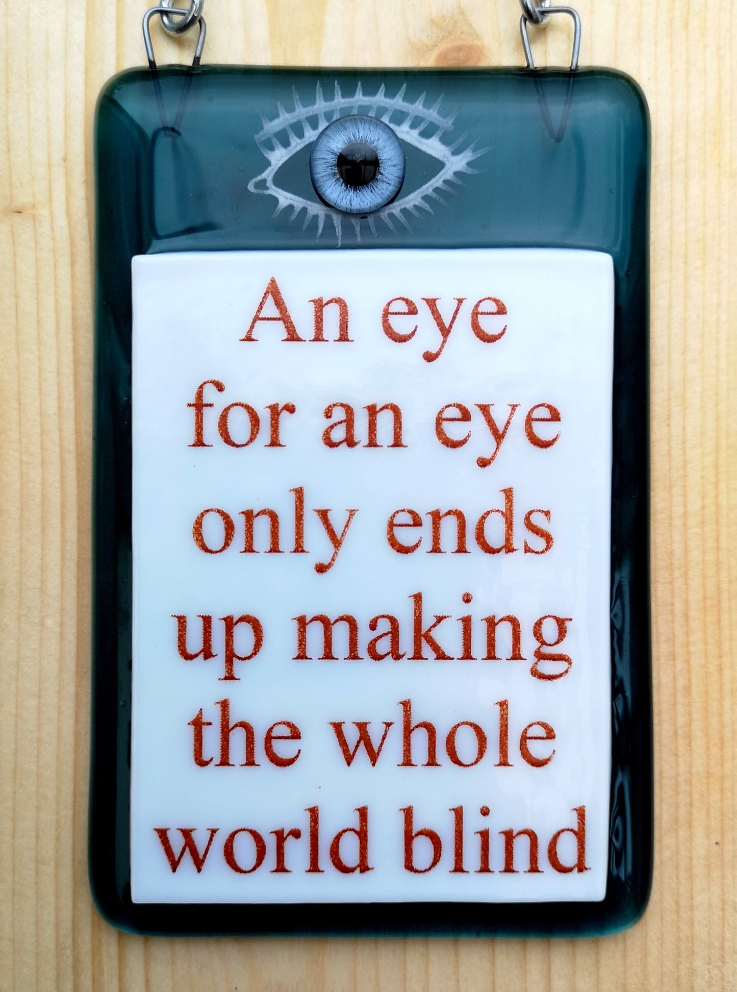 Handmade fused glass An Eye For An Eye Leaves The Whole World Blind hanging picture suncatcher. Inspirational gift, funny card, humorous quote plaque, positive message sign.