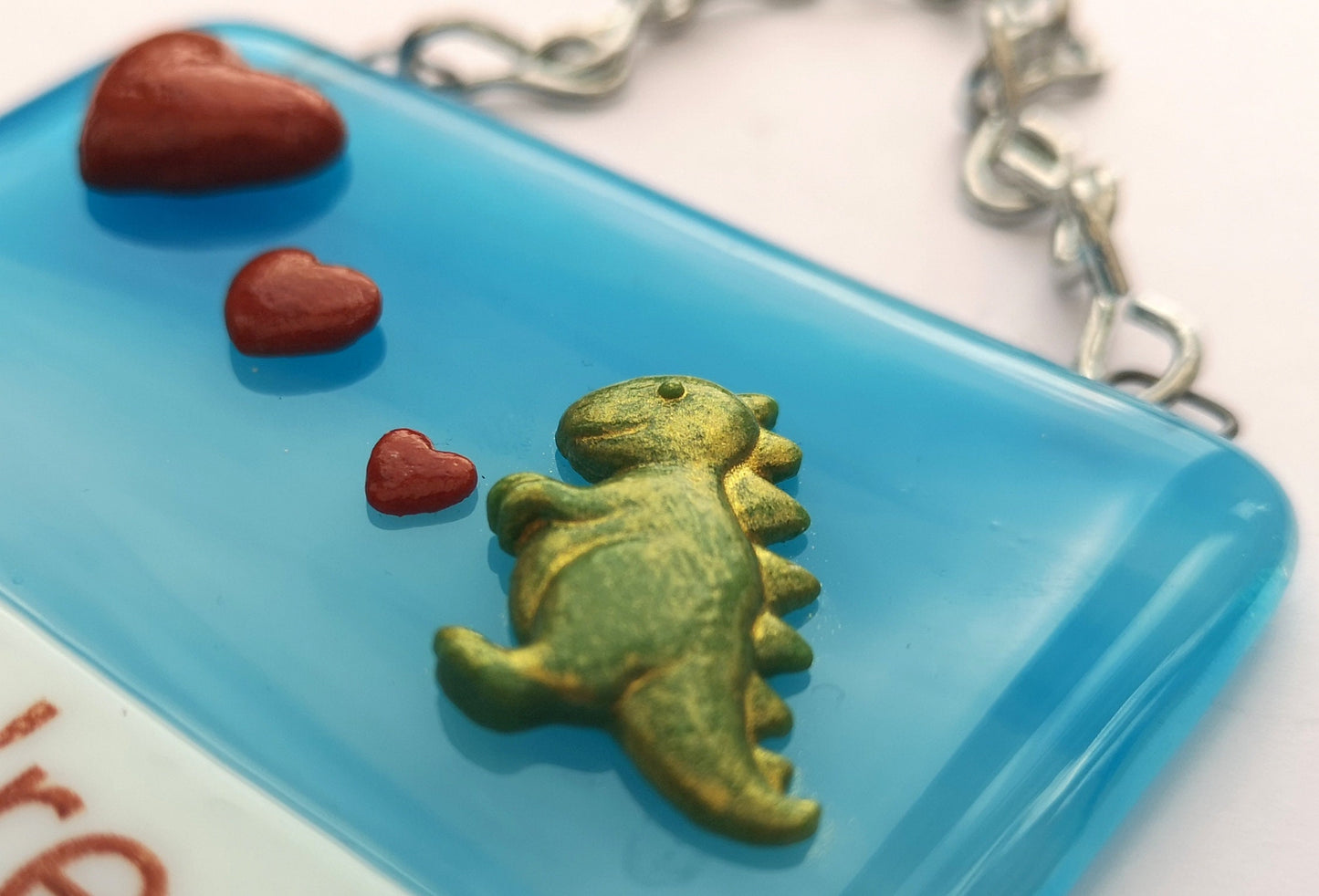 Handmade fused glass Awesome Roarsome Dinosaur Hanging Decoration. Valentine suncatcher gift. Romantic, love, message from the heart present. Girlfriend, boyfriend, partner, husband, wife.