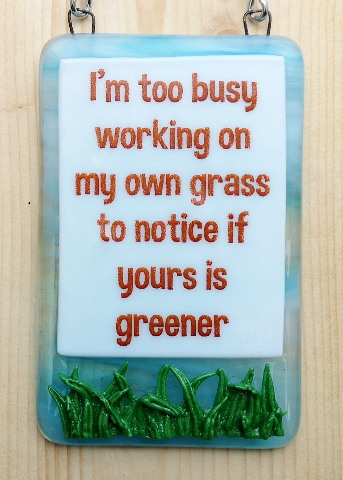 Handmade fused glass Busy Working On Own Grass To Notice If Yours Is Greener hanging picture suncatcher. Inspirational gift, funny card, humorous quote plaque, positive message sign.