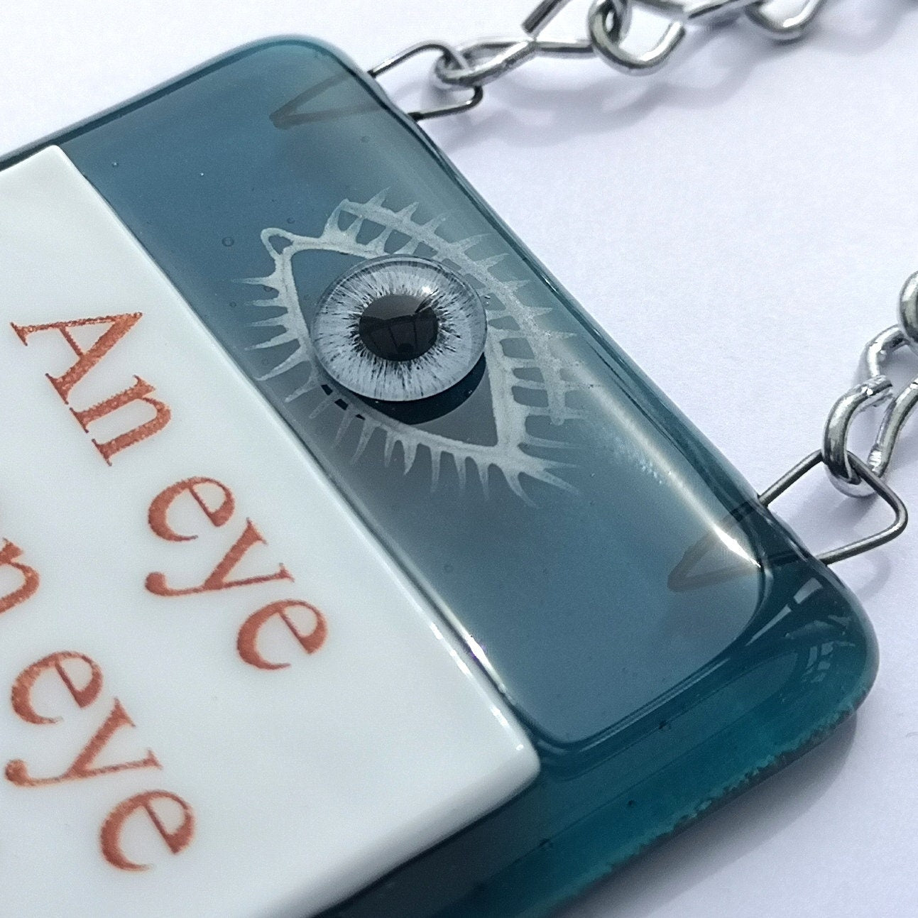 Handmade fused glass An Eye For An Eye Leaves The Whole World Blind hanging picture suncatcher. Inspirational gift, funny card, humorous quote plaque, positive message sign.