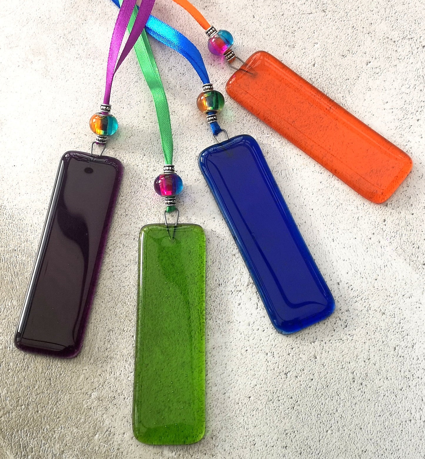 Handmade fused glass Rainbow Drops. Hanging Christmas tree decoration. Glass suncatcher bauble ornament, holiday decor gift, festive present.