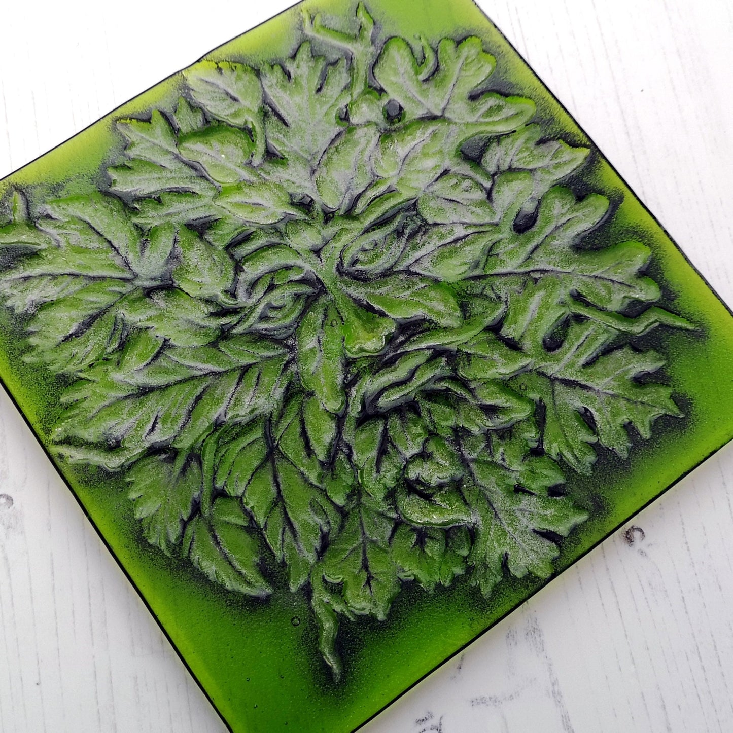 Handmade fused glass Greenman face hanging picture. Leaf man suncatcher, green glass tile plaque. Man of the woods wall art. Nature lover gift. Pagan gift.