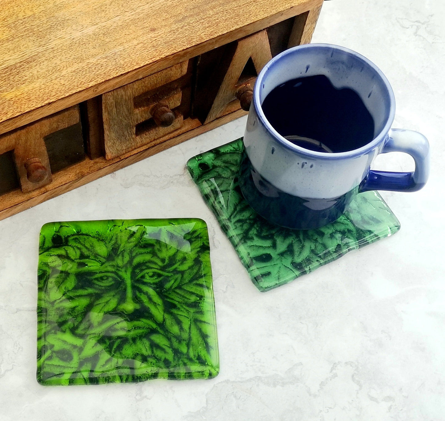 Handmade fused glass Greenman drinks coaster. Green man place mat. Leaf man, Greenman face, green glass tile. Man of the woods. Nature lover gift. Pagan gift.