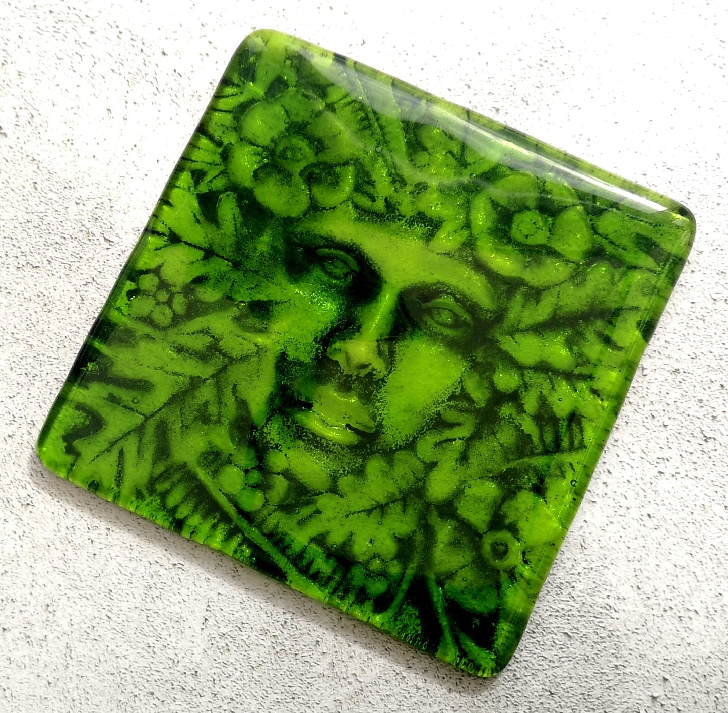 Handmade fused glass Lady Of The Woods drinks coaster. Green man face place mat. Leaf man, green woman glass tile. Nature lover gift. Pagan gift.