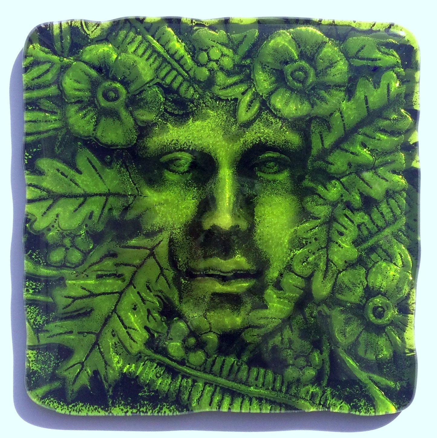 Handmade fused glass Lady Of The Woods drinks coaster. Green man face place mat. Leaf man, green woman glass tile. Nature lover gift. Pagan gift.