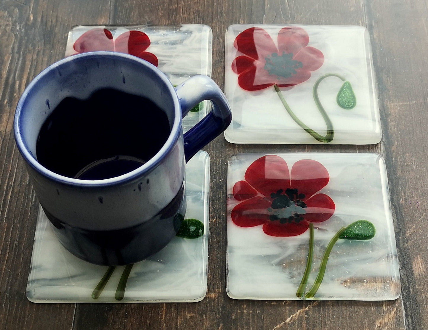 Handmade fused glass poppy flower drinks coaster. Poppies, garden flowers glass wall tile. Nature hot drink table mat, floral decor gift. Suncatcher flower picture, home decoration, dining table protection.