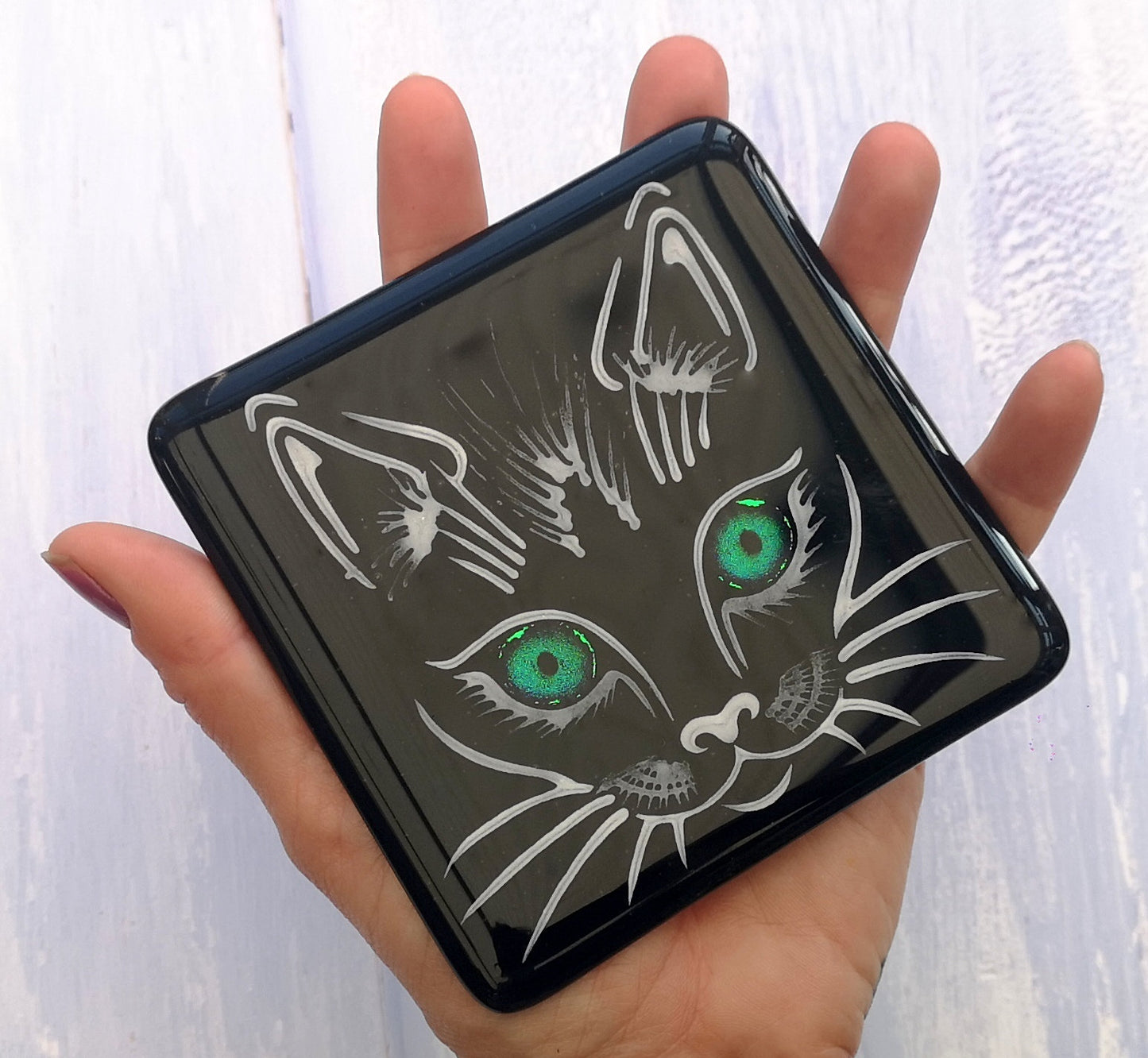 Handmade fused glass cat face drinks coaster with reflective dichroic glass eyes. Glass tile, lucky black cat. Hot drink table mat, feline decor gift. Lucky cat, crazy cat decoration, wall tile, kitten, kitty cat lover.