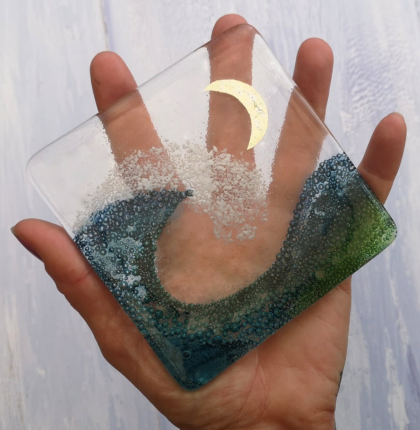 Handmade fused glass wave drinks coaster with embedded coloured bubbles and pure silver foil moon. Glass wall tile, hot drink table mat, sea, ocean home decoration, dining table protection. Beach gift.