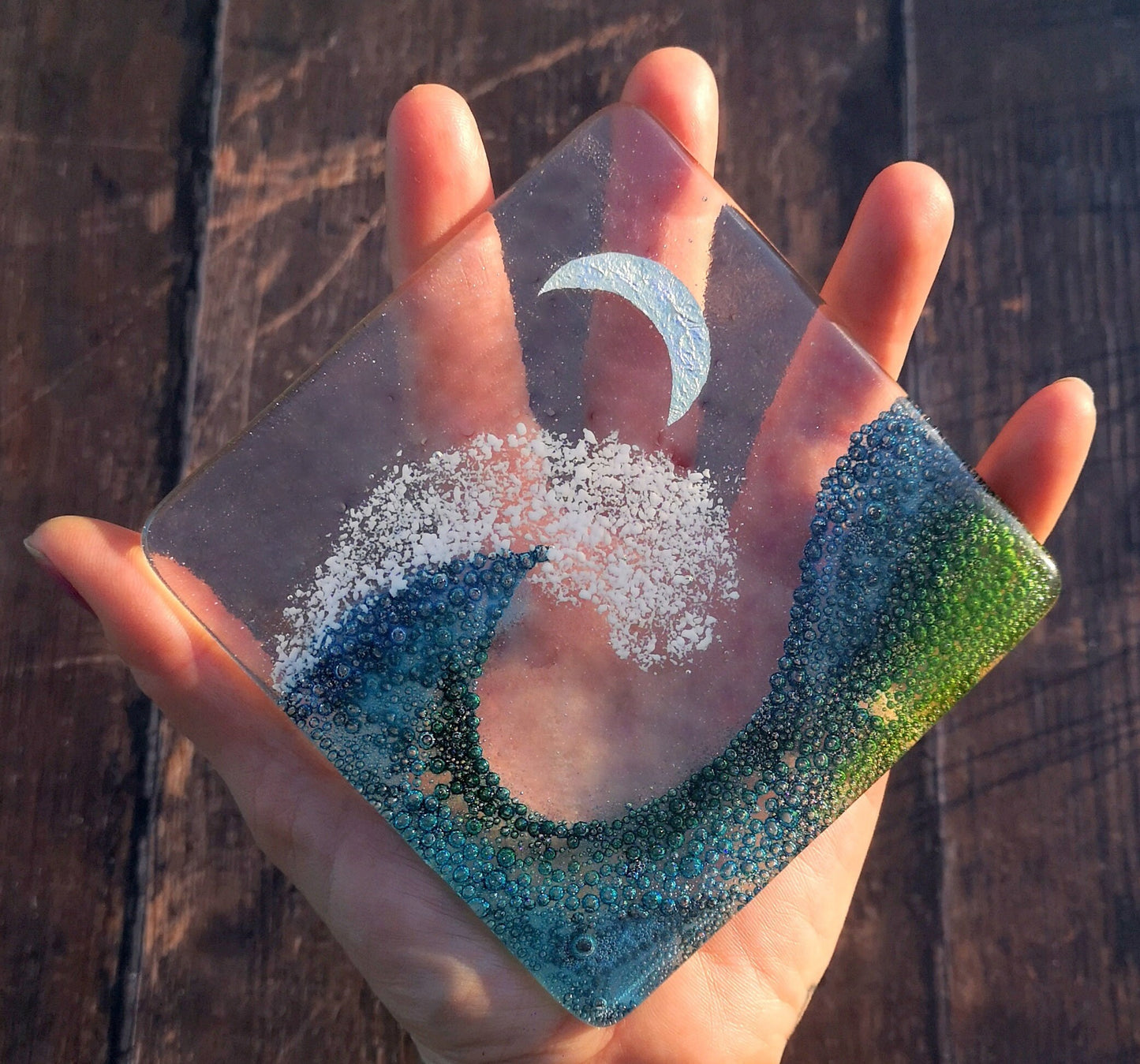 Handmade fused glass wave drinks coaster with embedded coloured bubbles and pure silver foil moon. Glass wall tile, hot drink table mat, sea, ocean home decoration, dining table protection. Beach gift.