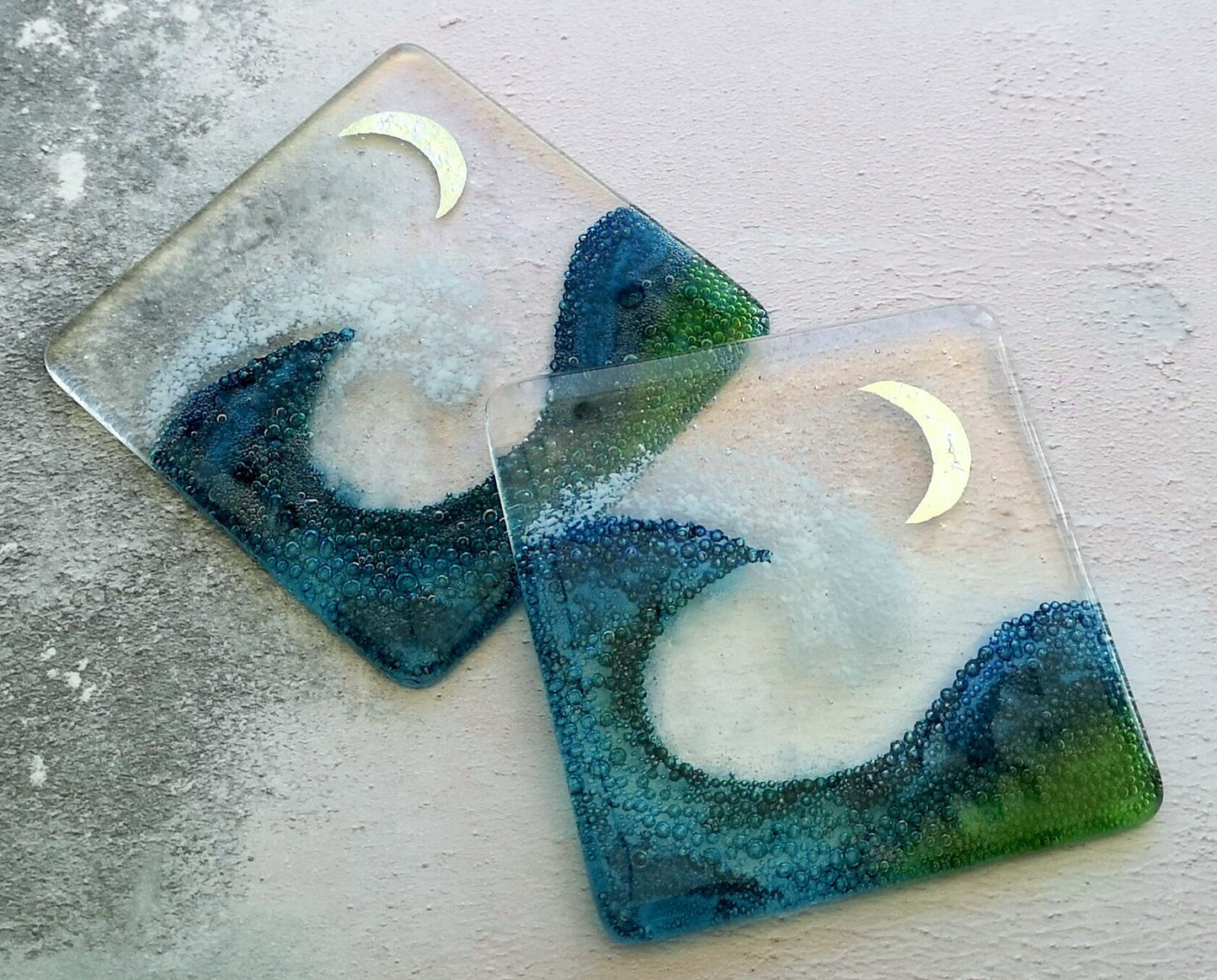 Handmade fused glass wave drinks coaster with embedded coloured bubbles and pure silver foil moon. Glass wall tile, hot drink table mat, sea, ocean home decoration, dining table protection. Beach gift.