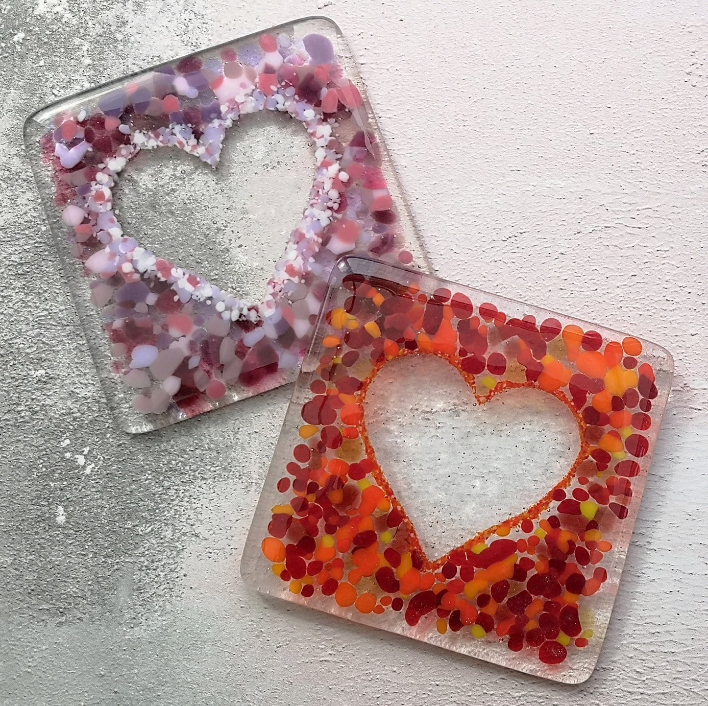 Handmade fused glass love heart drinks coaster, glass heart design wall tile. Pink, red home decoration, dining table protection. Valentine, romantic gift. Wedding present.