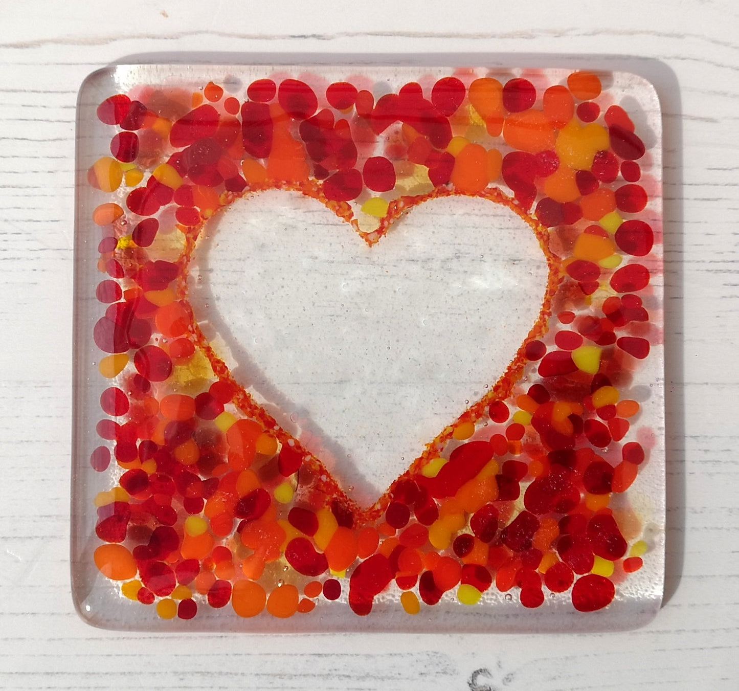 Handmade fused glass love heart drinks coaster, glass heart design wall tile. Pink, red home decoration, dining table protection. Valentine, romantic gift. Wedding present.