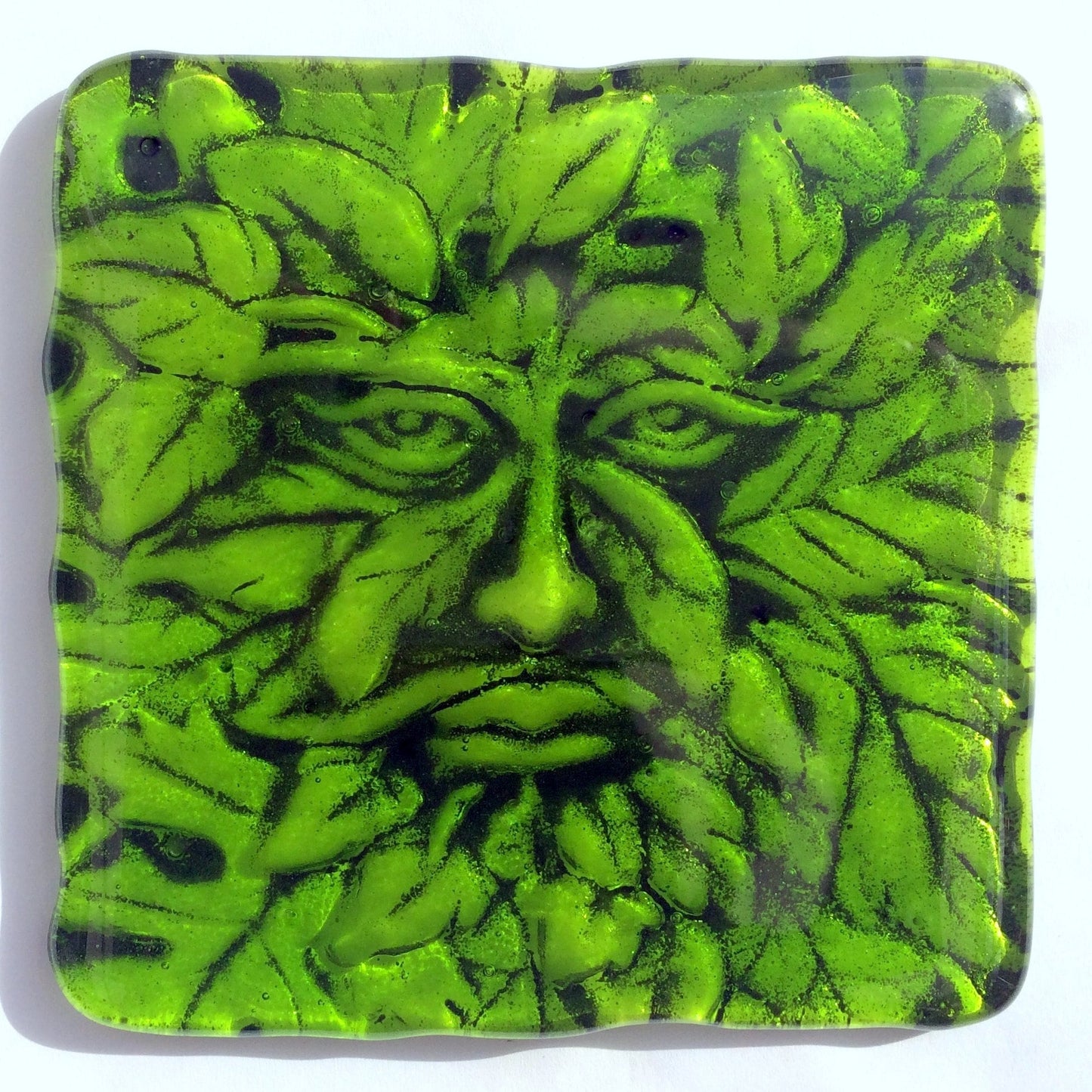 Handmade fused glass Greenman drinks coaster. Green man place mat. Leaf man, Greenman face, green glass tile. Man of the woods. Nature lover gift. Pagan gift.