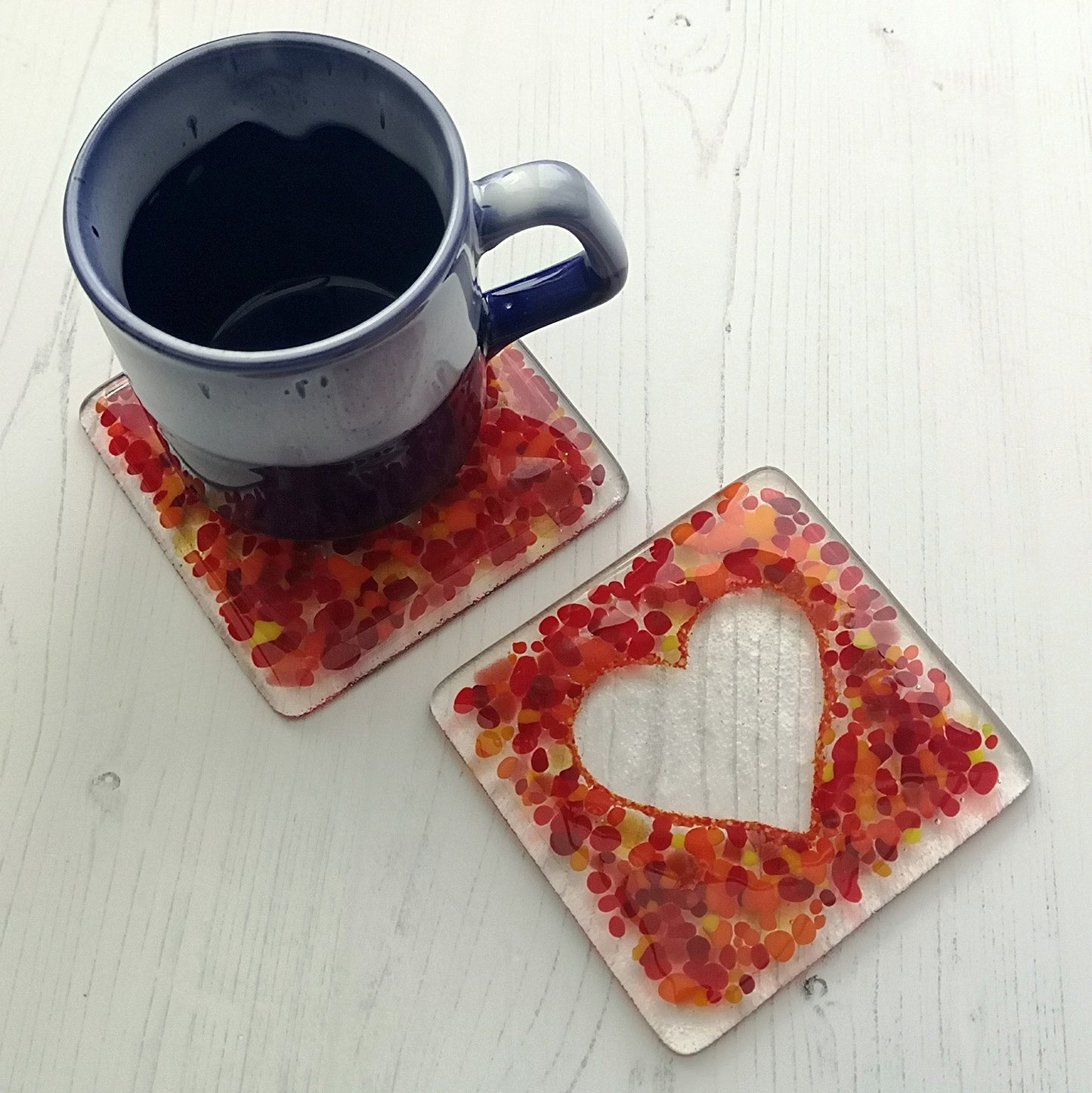Handmade fused glass love heart drinks coaster, glass heart design wall tile. Pink, red home decoration, dining table protection. Valentine, romantic gift. Wedding present.