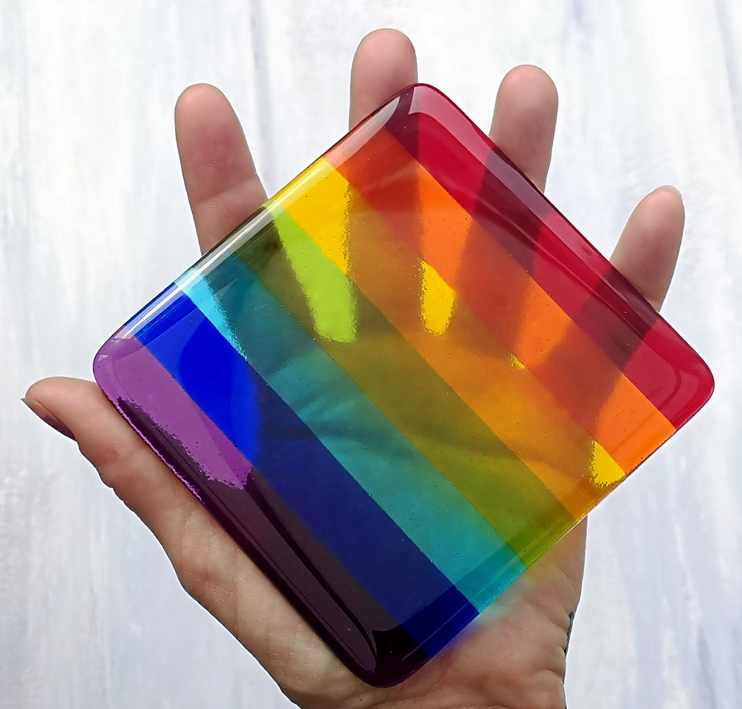 Handmade fused glass rainbow striped drinks coaster. Colourful glass wall tile. Hot drink table mat, rainbow decor, brightly coloured gift. Suncatcher multicoloured picture, home decoration, dining table protection.