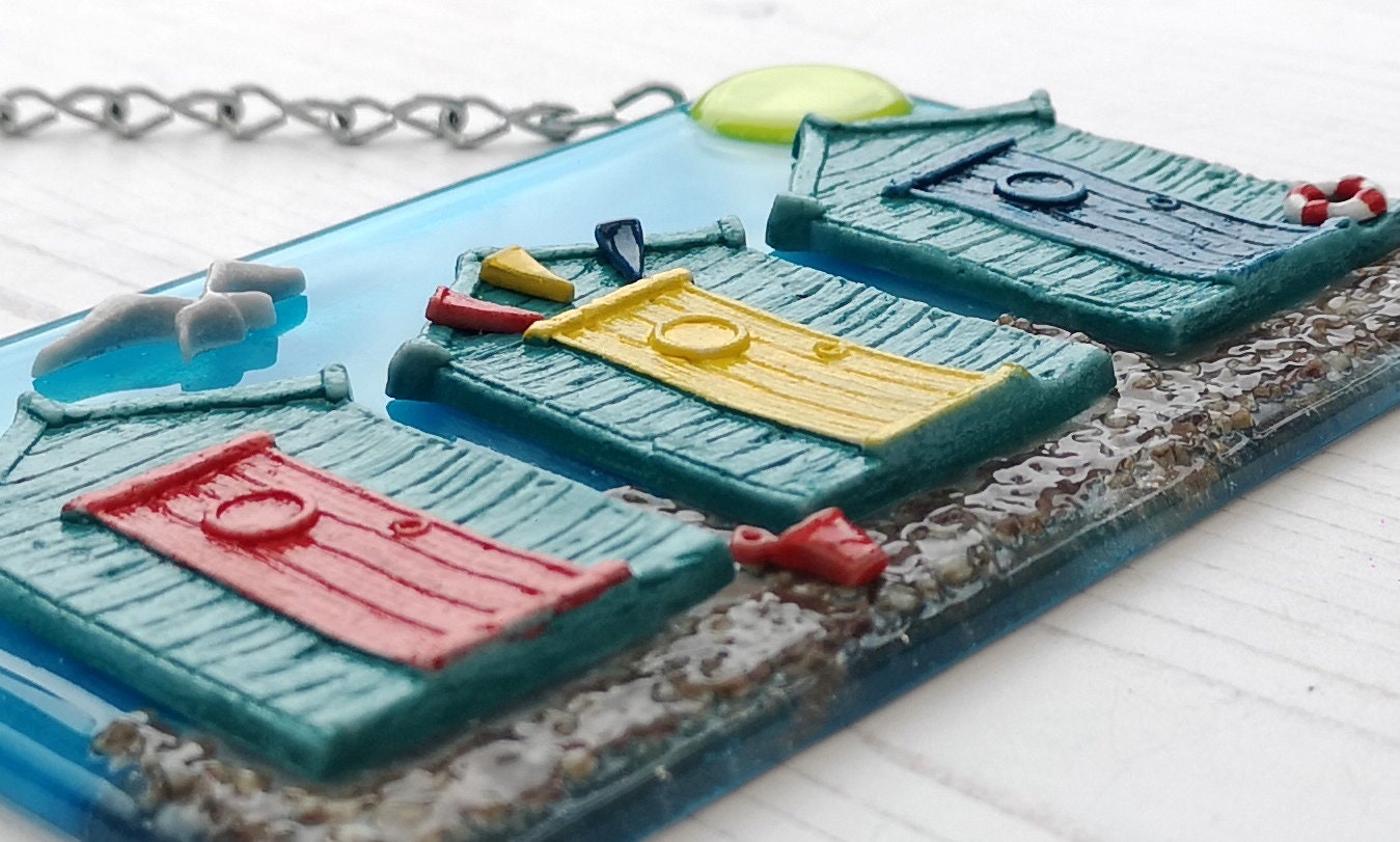 Handmade fused glass 3D Beach Huts Hanging Picture. Seaside wall art, beach gift decoration, sea ocean scene with glass pebbles, seagull, bucket and spade, bunting.