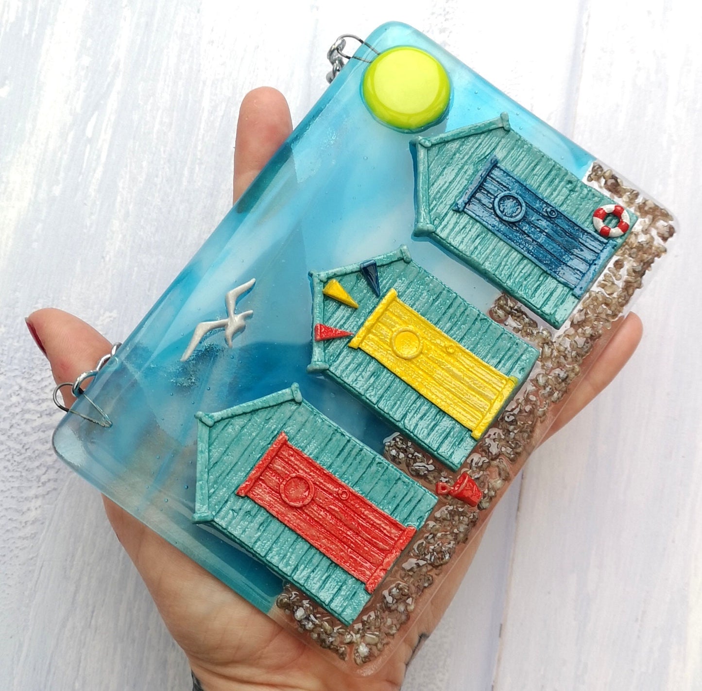 Handmade fused glass 3D Beach Huts Hanging Picture. Seaside wall art, beach gift decoration, sea ocean scene with glass pebbles, seagull, bucket and spade, bunting.
