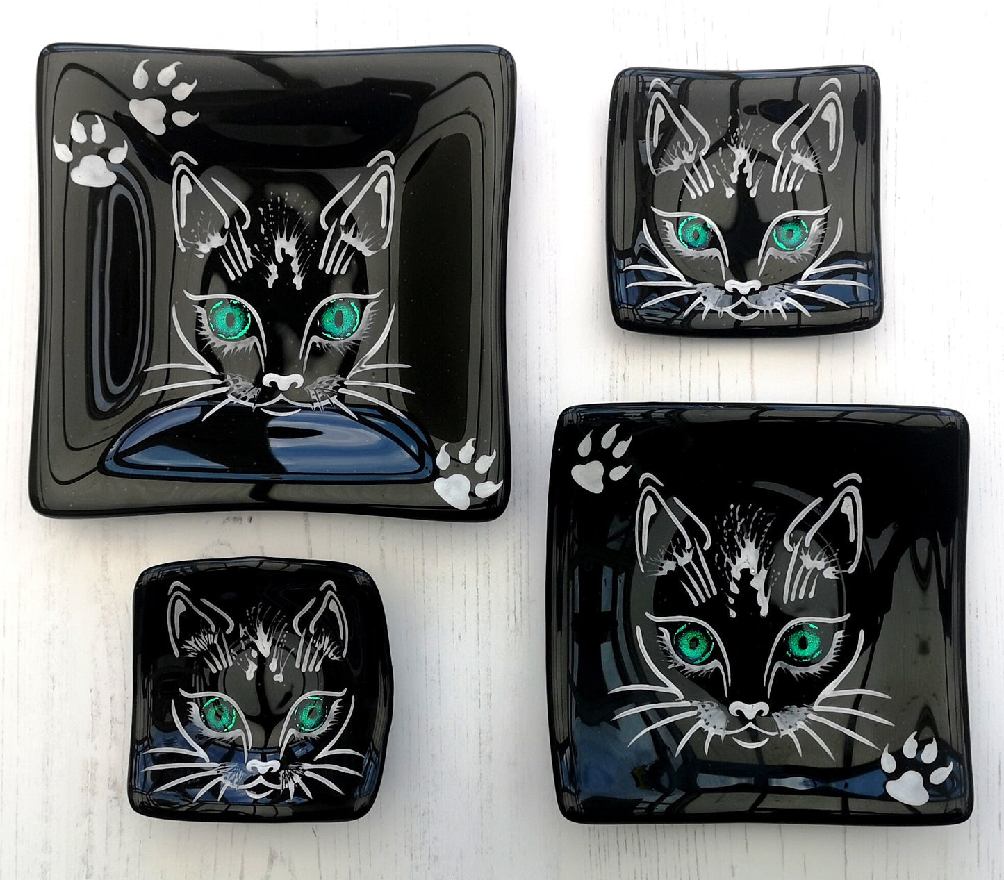 Handmade fused glass cat face bowls, with reflective dichroic glass eyes. Hand painted dish. Four different size serving plates. Cat lover Gift. Lucky black cat.